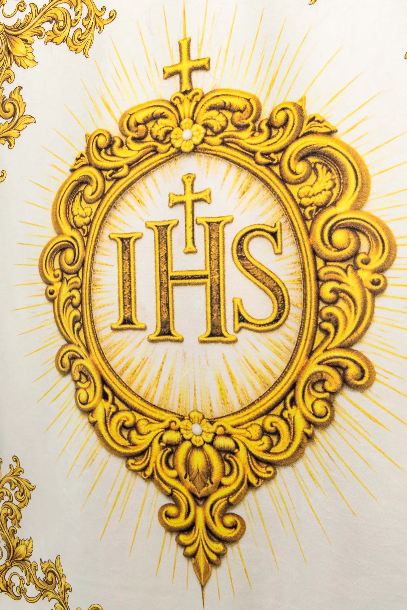 Double-sided printed processional banner featuring the Sacred Heart of Jesus on one side and the IHS symbol on the other, with gold ornamentation.