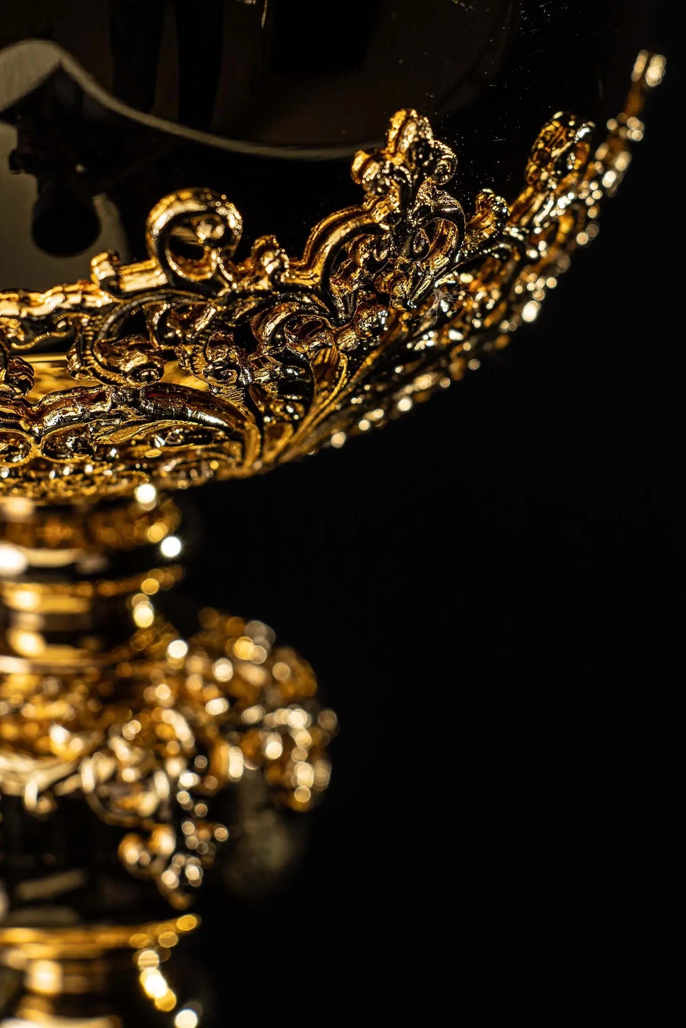 Handmade gold-plated ciborium with floral ornamentation and blue imitation sapphires, topped with a cross.