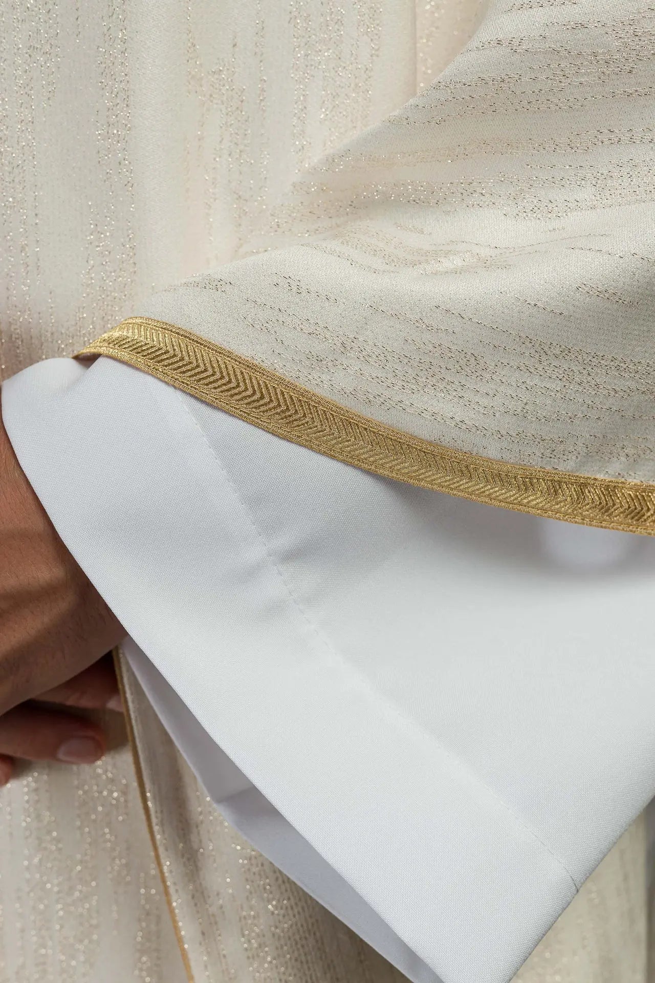 Ecru chasuble with an embroidered Marian motif on decorative fabric