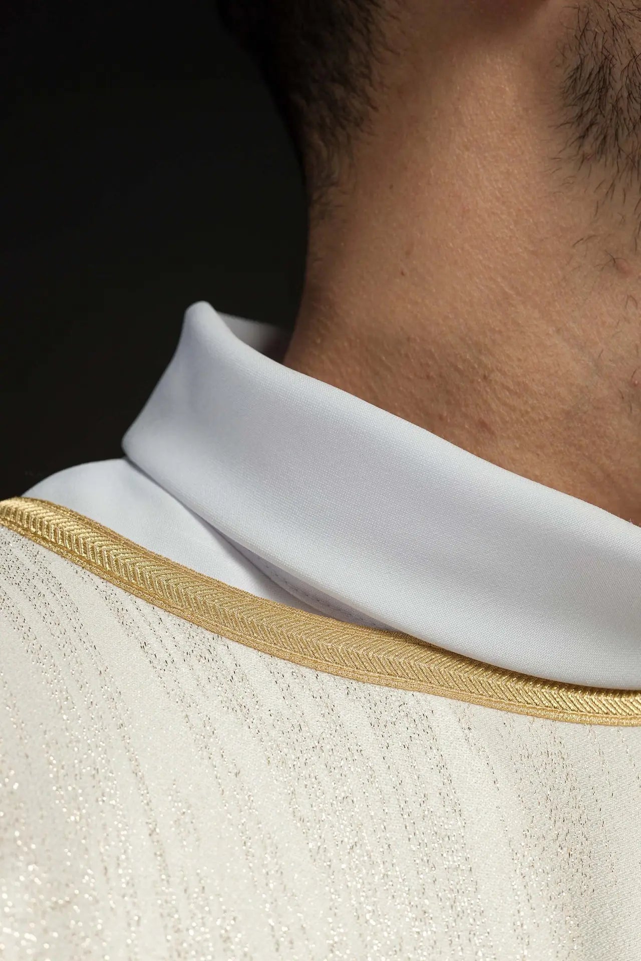 Ecru chasuble with an embroidered Marian motif on decorative fabric