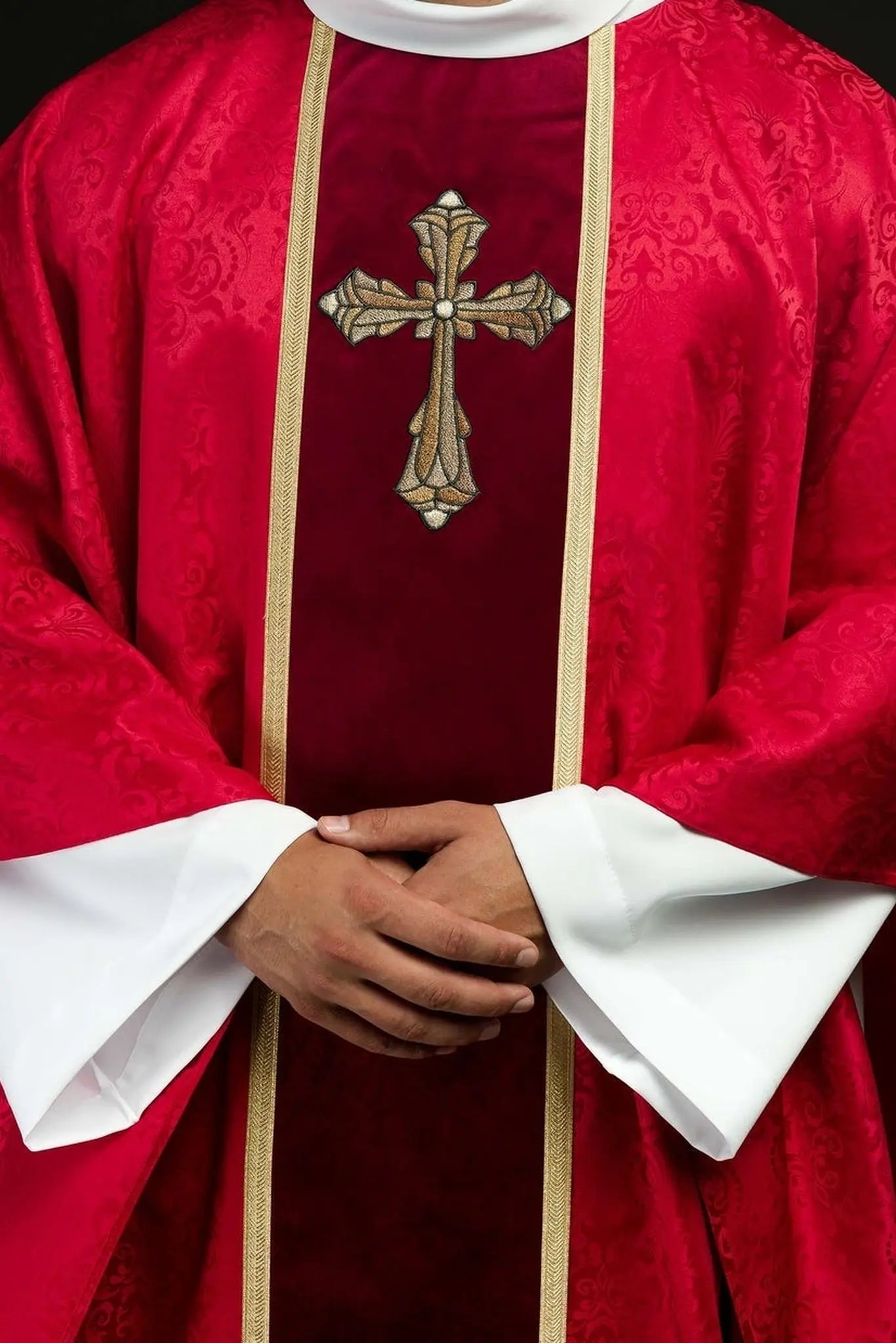 Liturgical red chasuble with band and embroidered cross on jacquard fabric