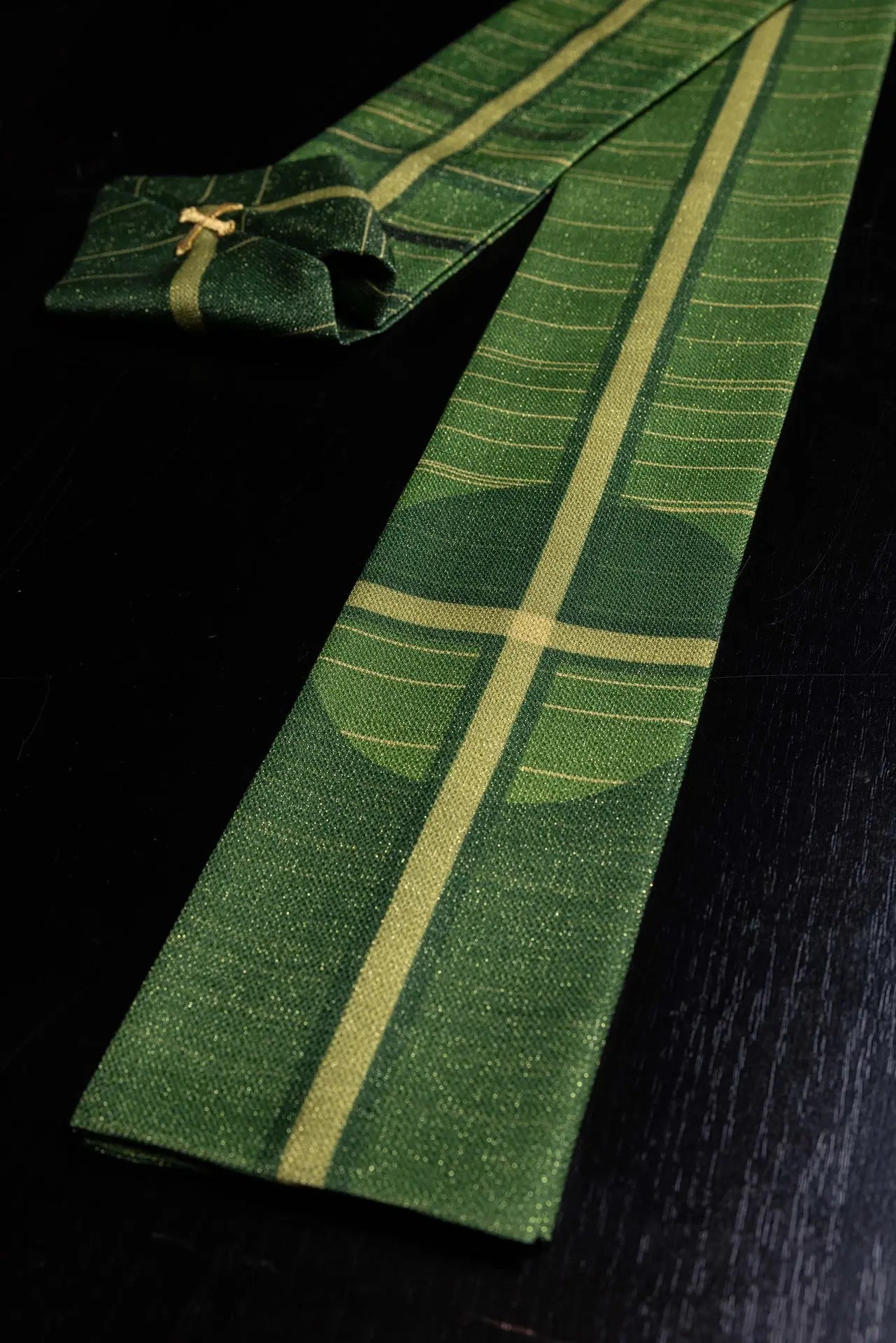 Green printed chasuble with a cross motif
