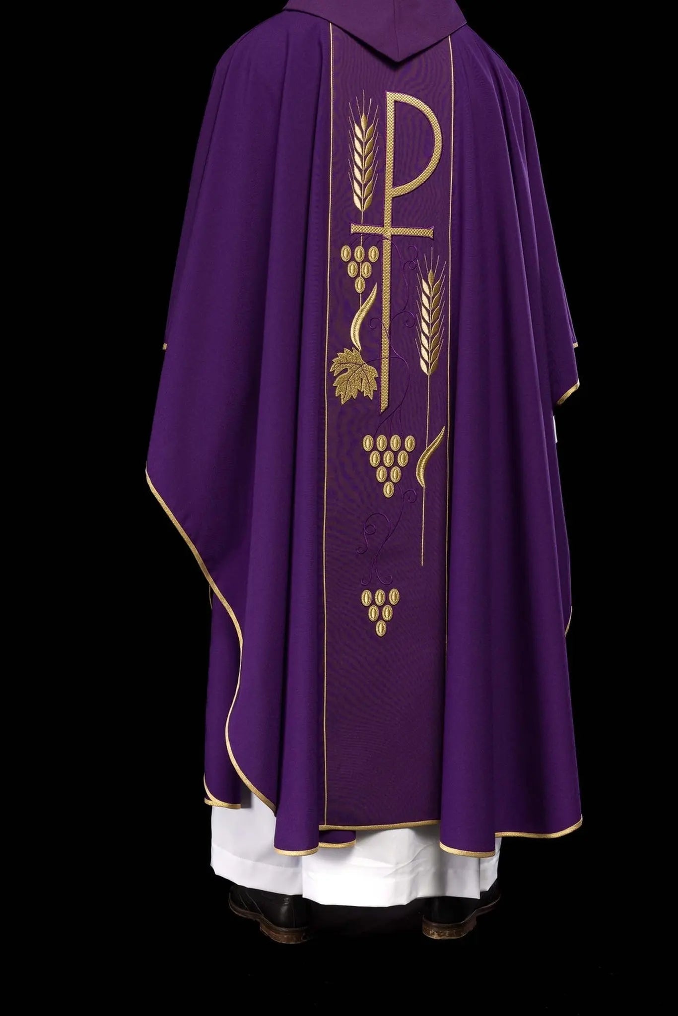 Purple chasuble embroidered with IHS chalice pattern
