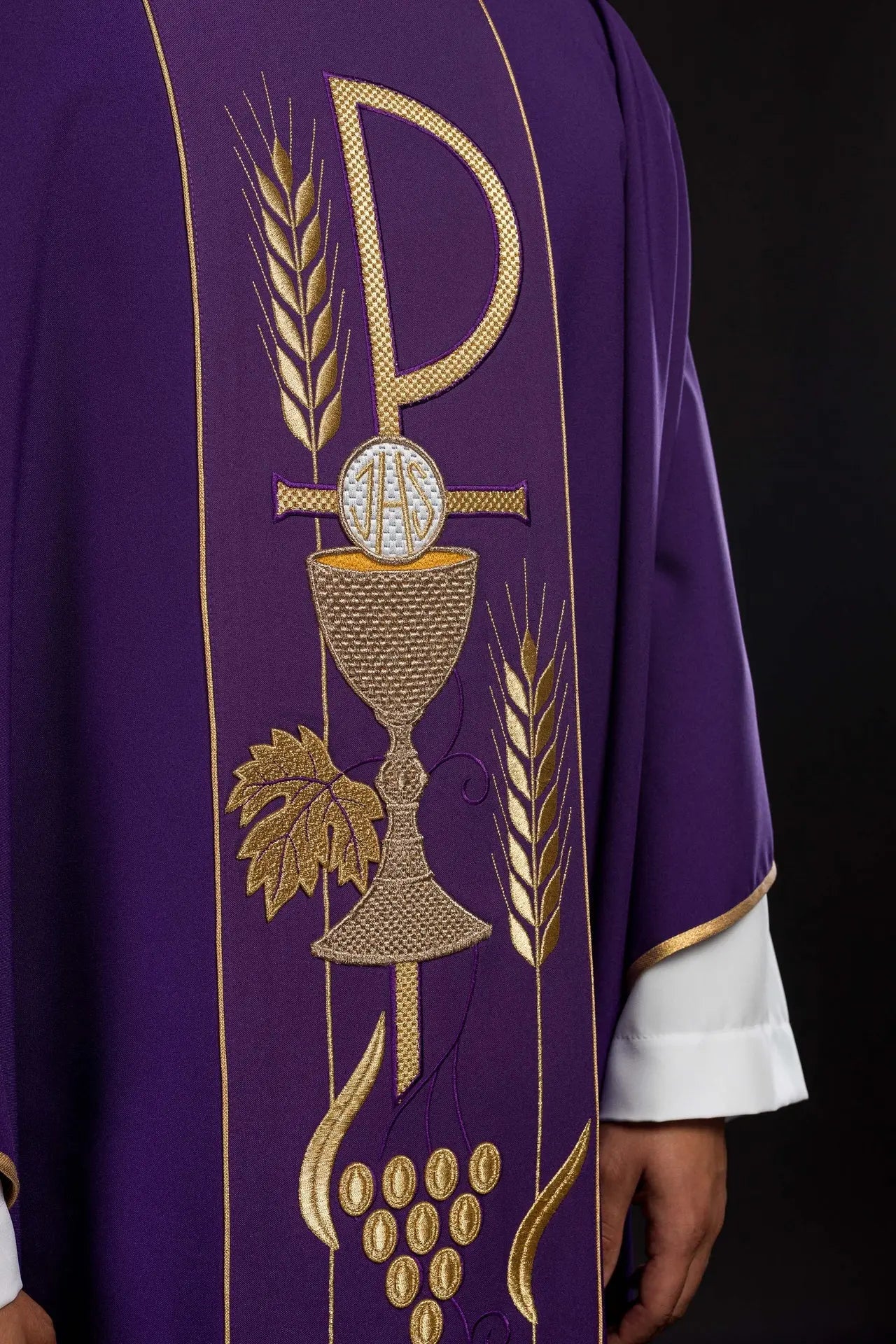 Purple chasuble embroidered with IHS chalice pattern