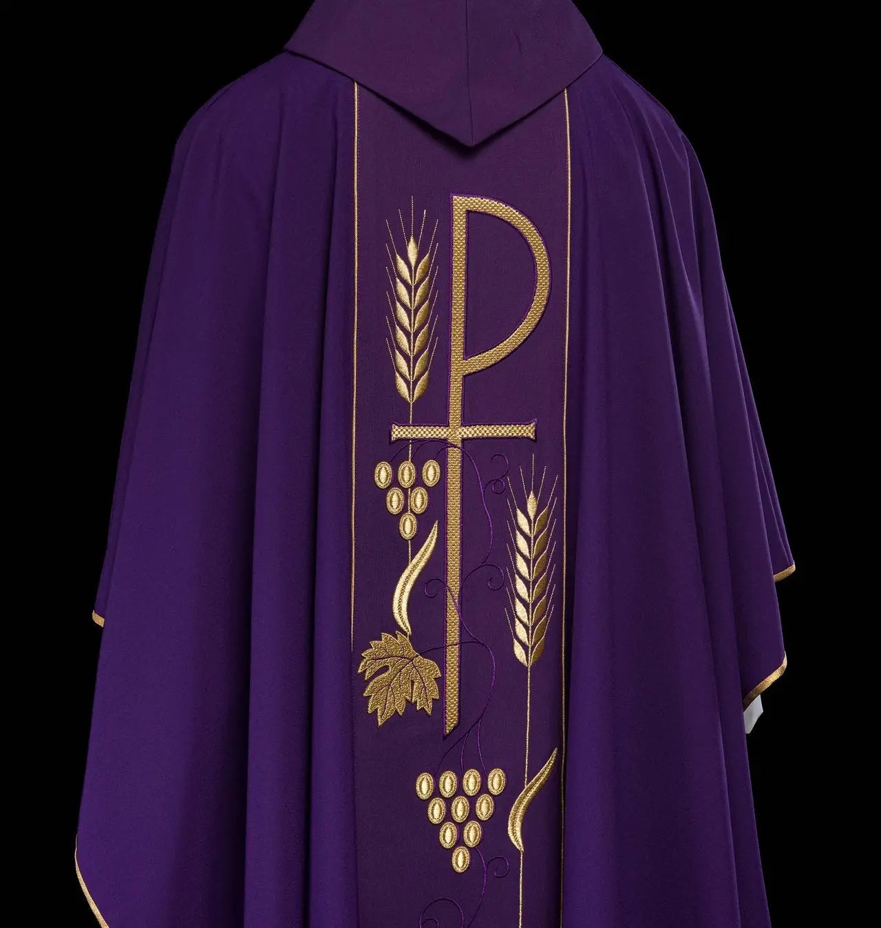 Purple chasuble embroidered with IHS chalice pattern