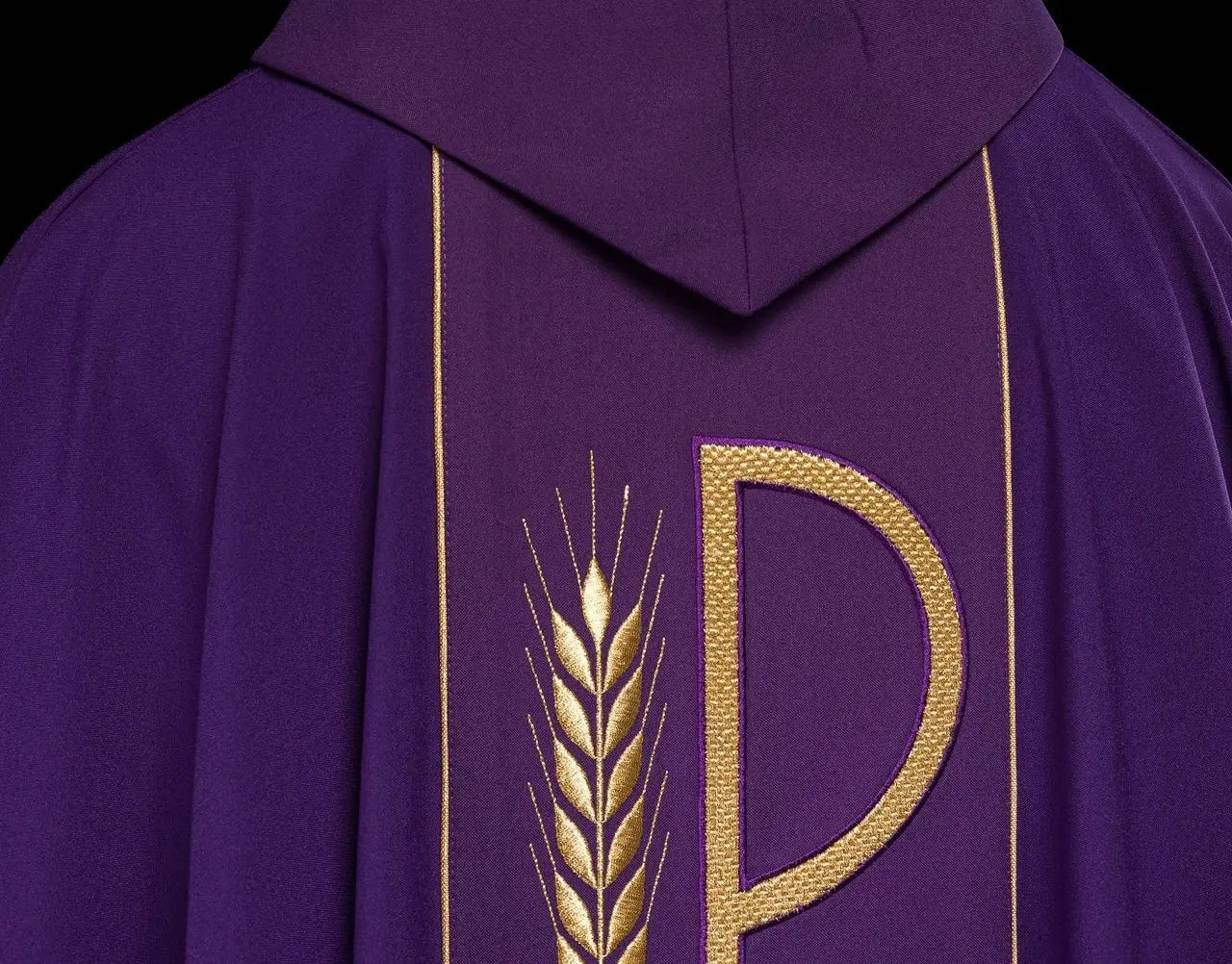 Purple chasuble embroidered with IHS chalice pattern