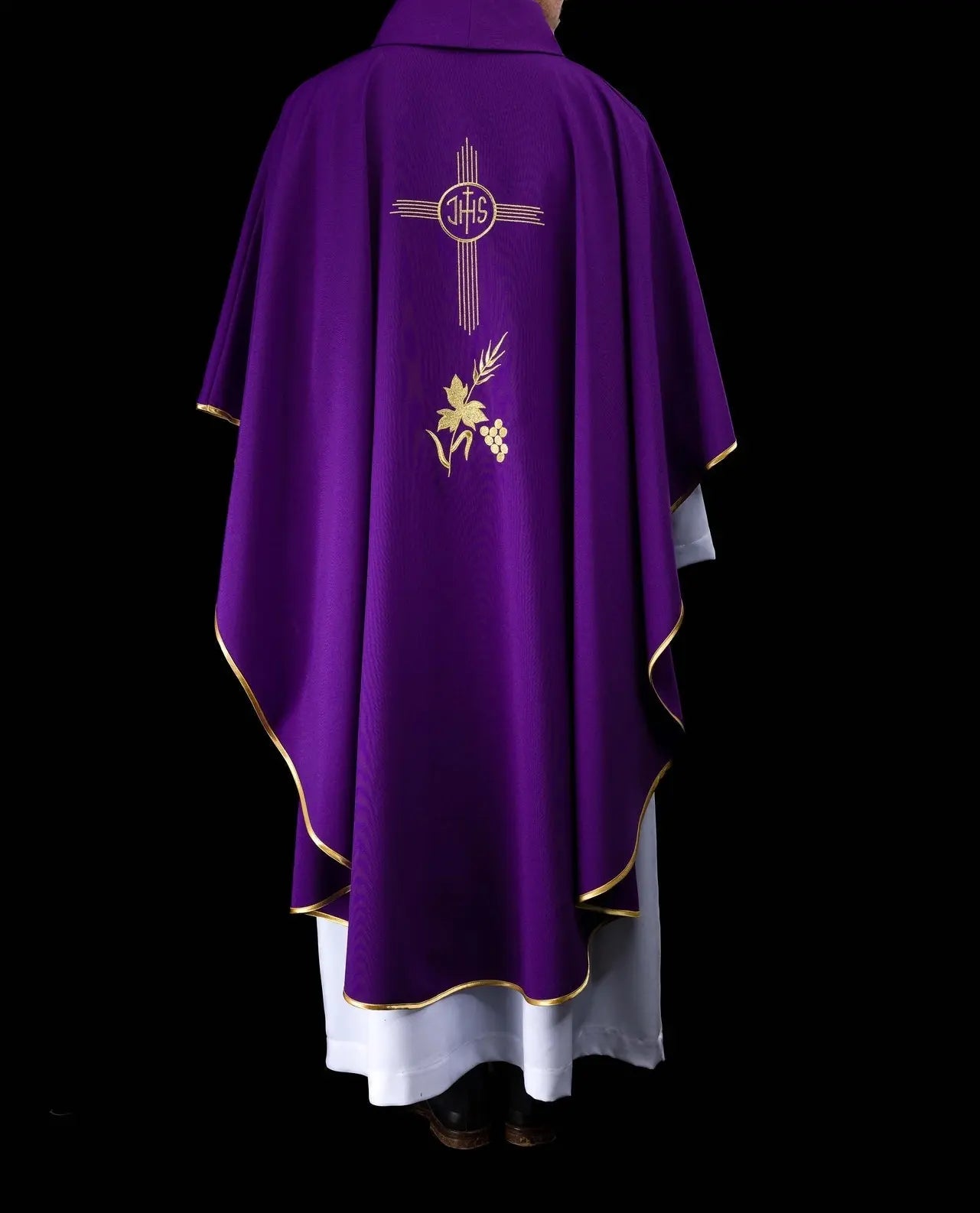 Purple chasuble embroidered with IHS motif