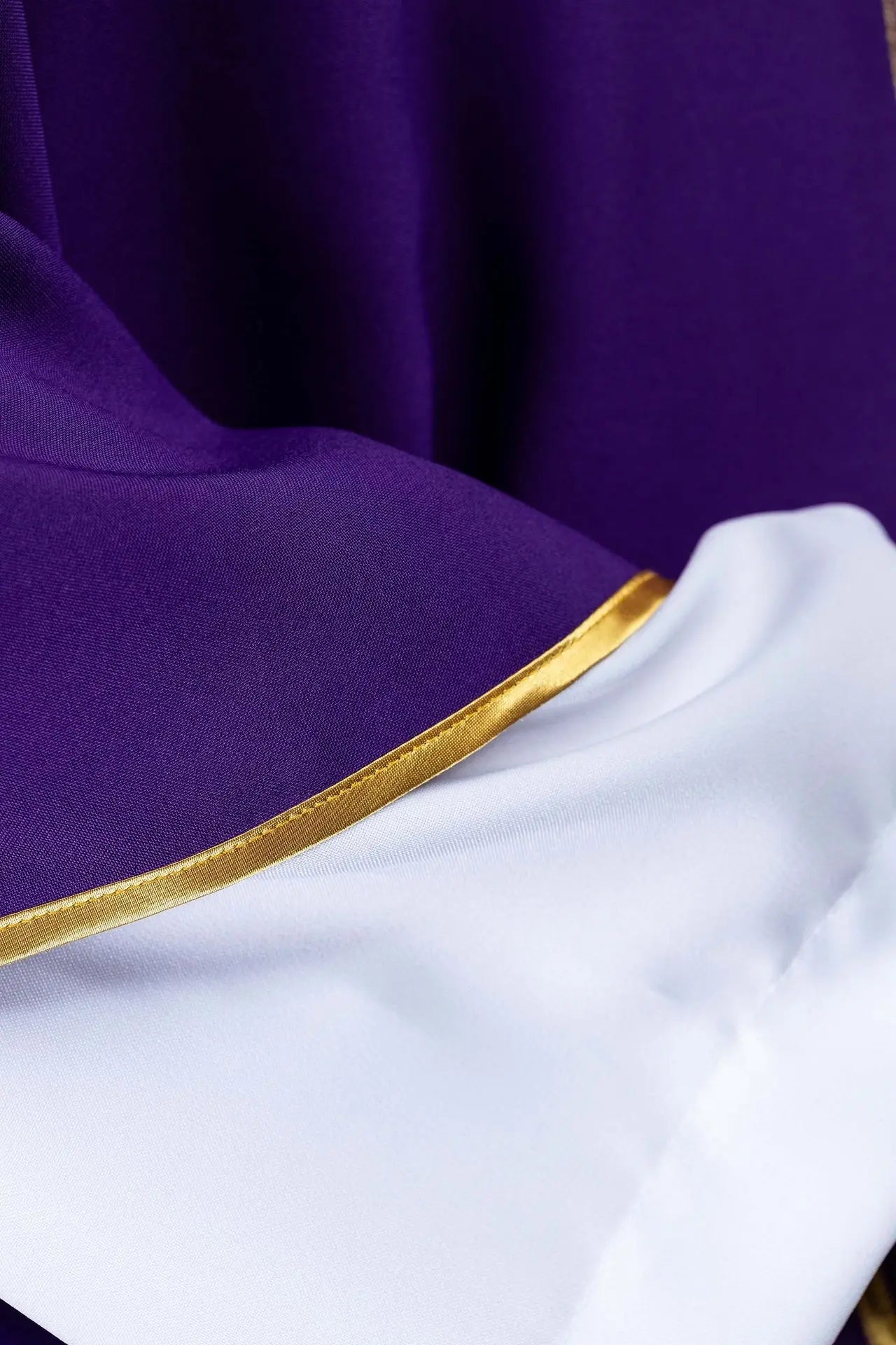 Purple chasuble embroidered with IHS motif