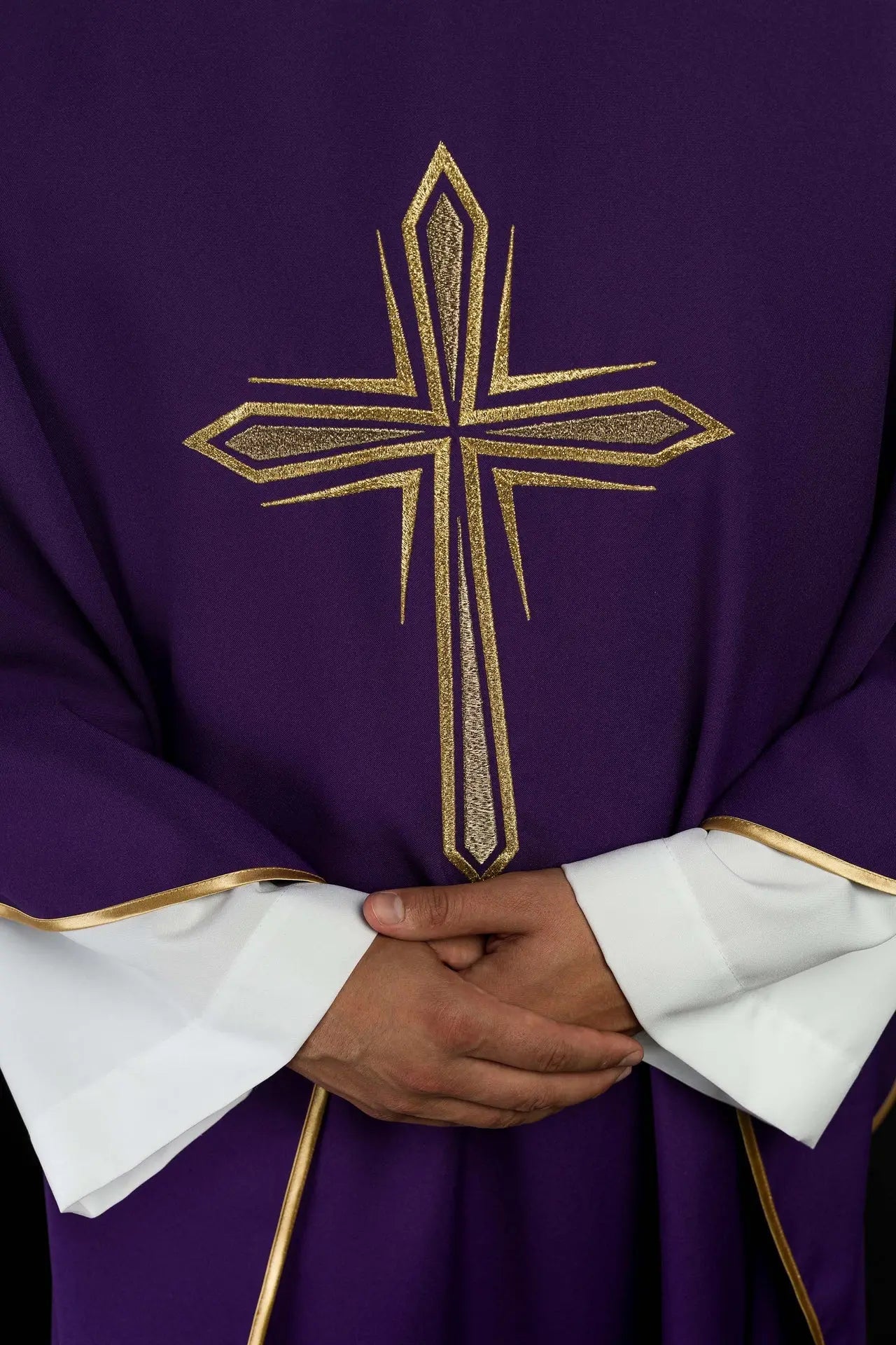 Purple chasuble with embroidery of the cross and gold piping