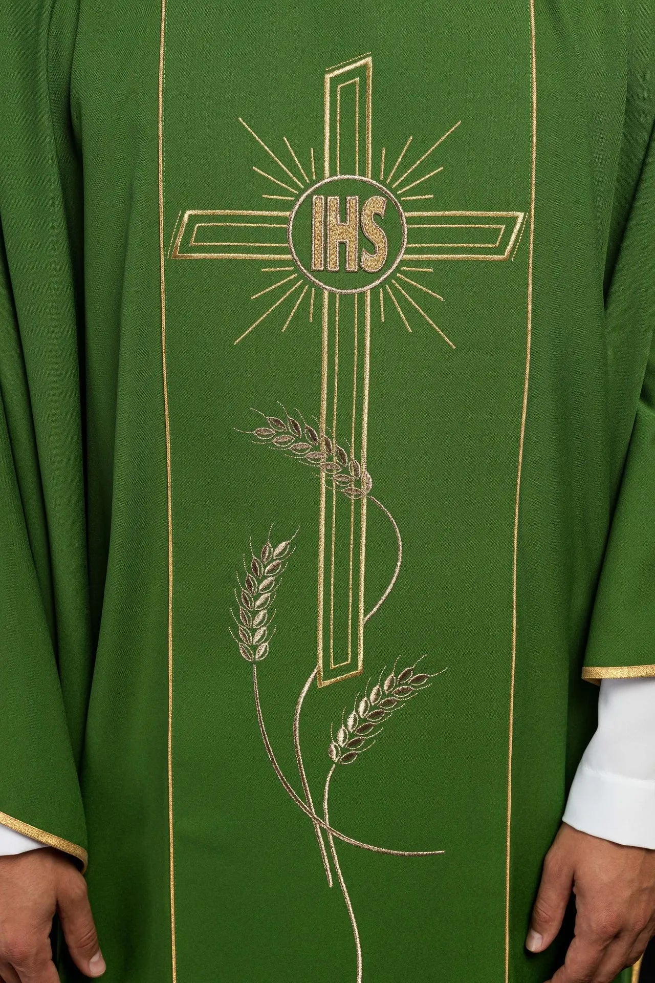 Green chasuble with wide embroidered gold stripe IHS cross