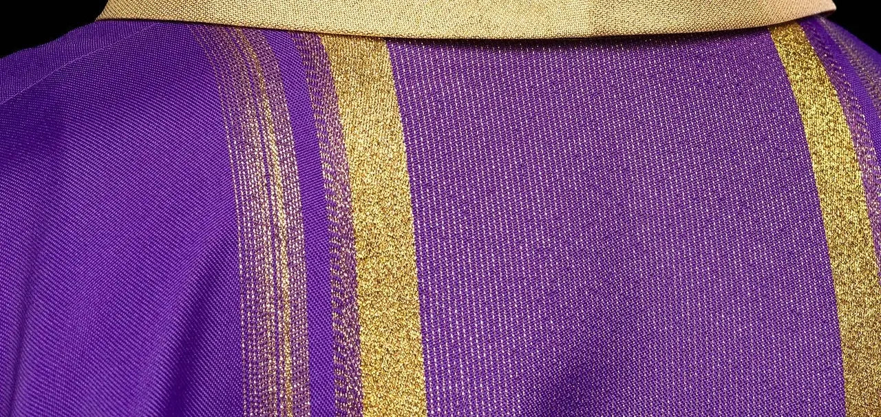 Purple embroidered chasuble with IHS design with gilding