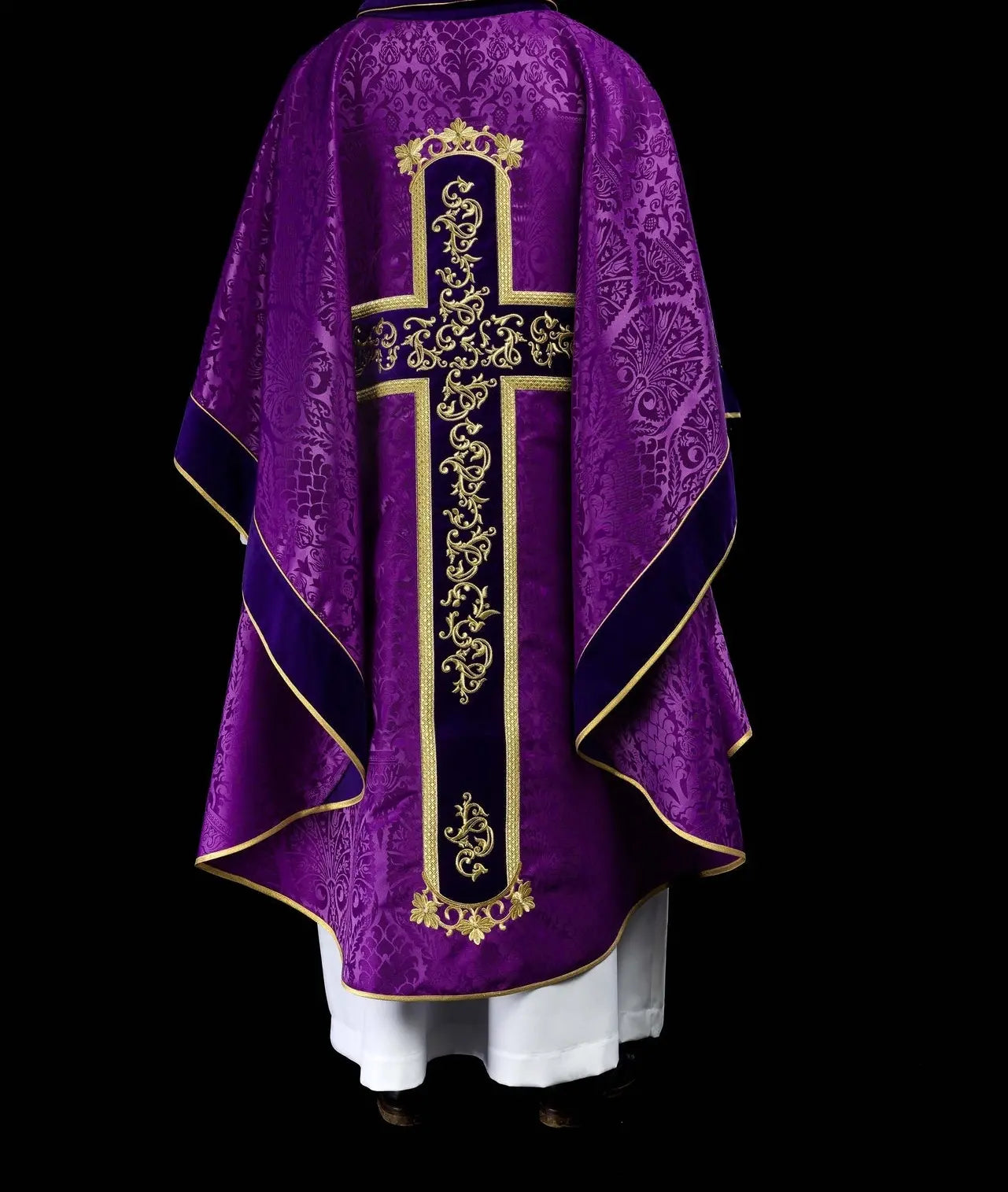 Purple chasuble embroidered with pattern of Jesus Christ