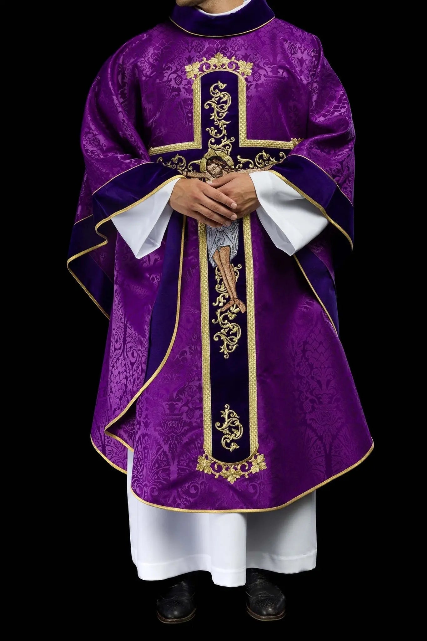 Purple chasuble embroidered with pattern of Jesus Christ