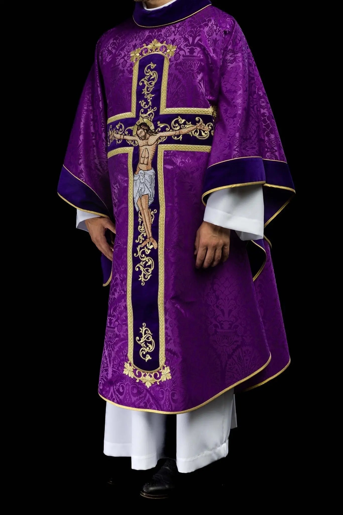 Purple chasuble embroidered with pattern of Jesus Christ