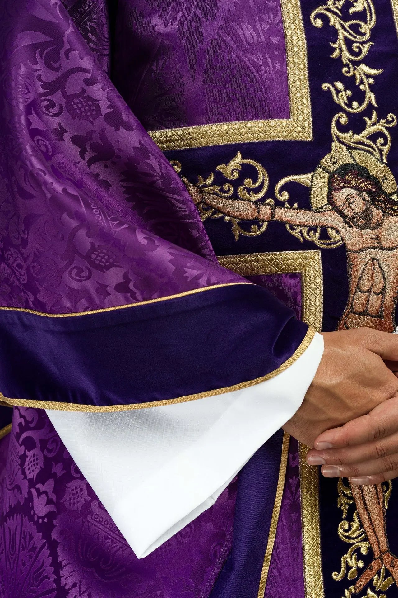 Purple chasuble embroidered with pattern of Jesus Christ