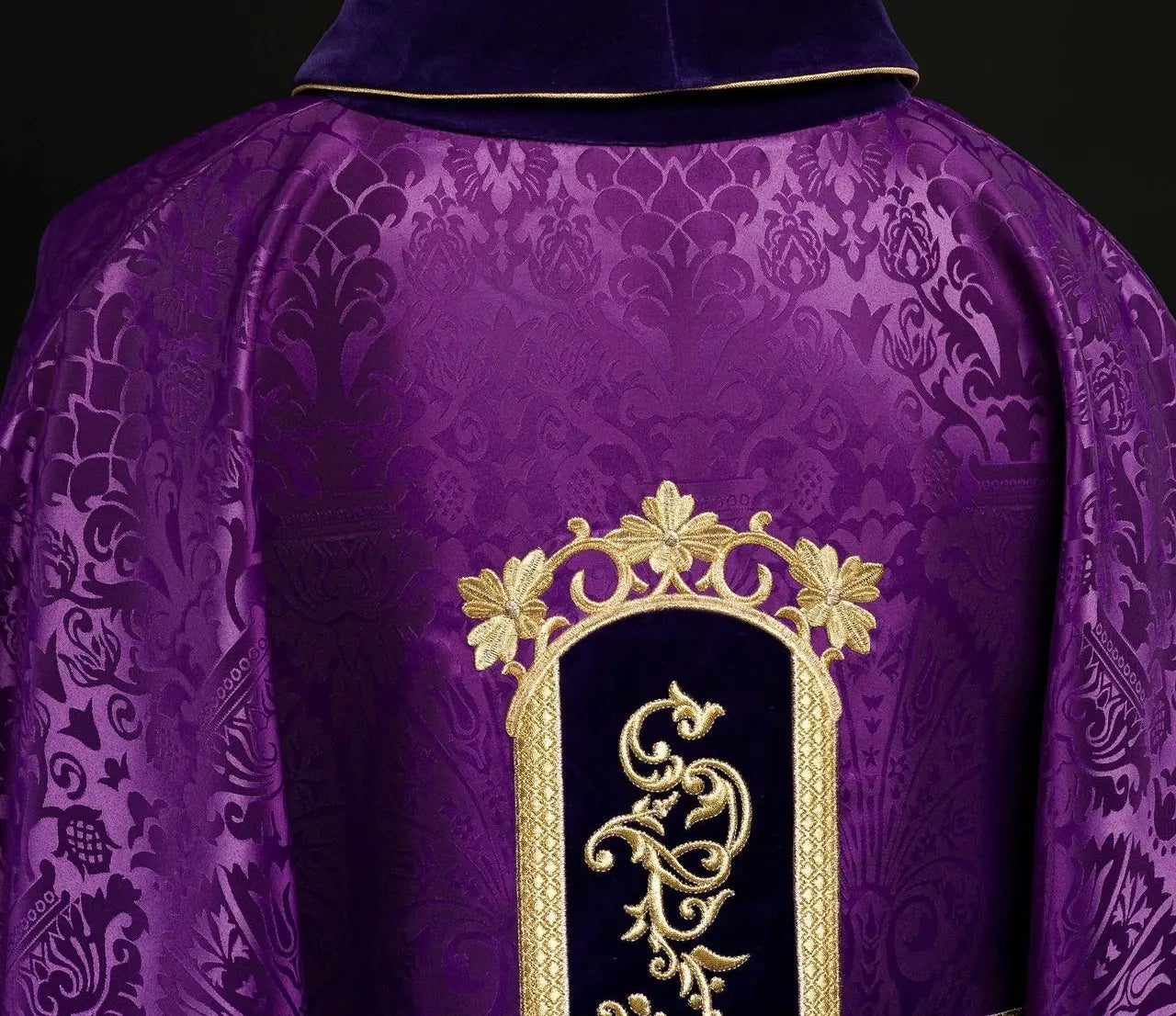 Purple chasuble embroidered with pattern of Jesus Christ