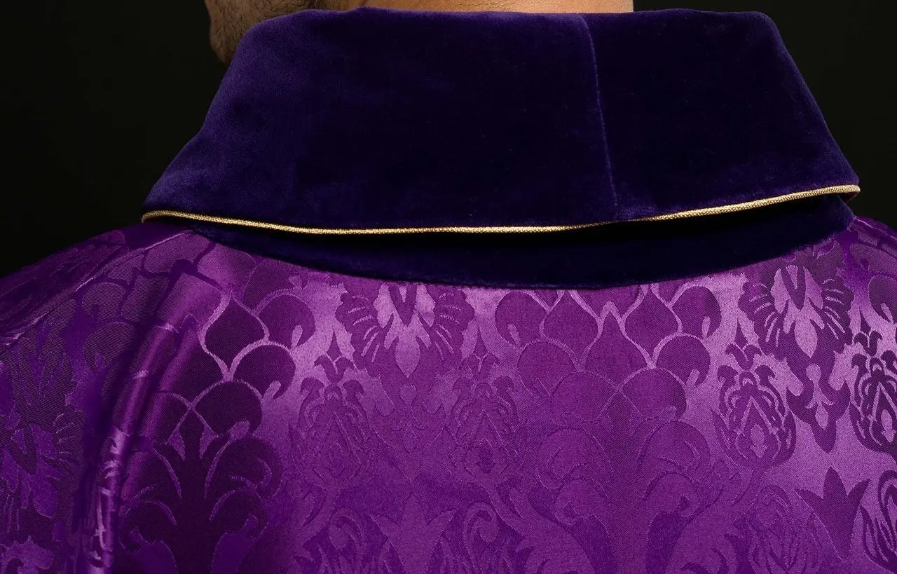 Purple chasuble embroidered with pattern of Jesus Christ