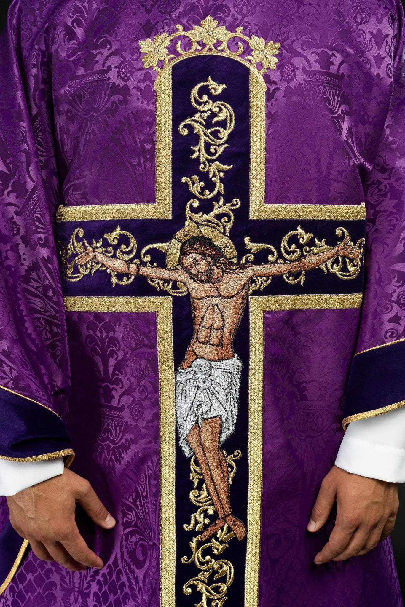 Purple chasuble embroidered with pattern of Jesus Christ