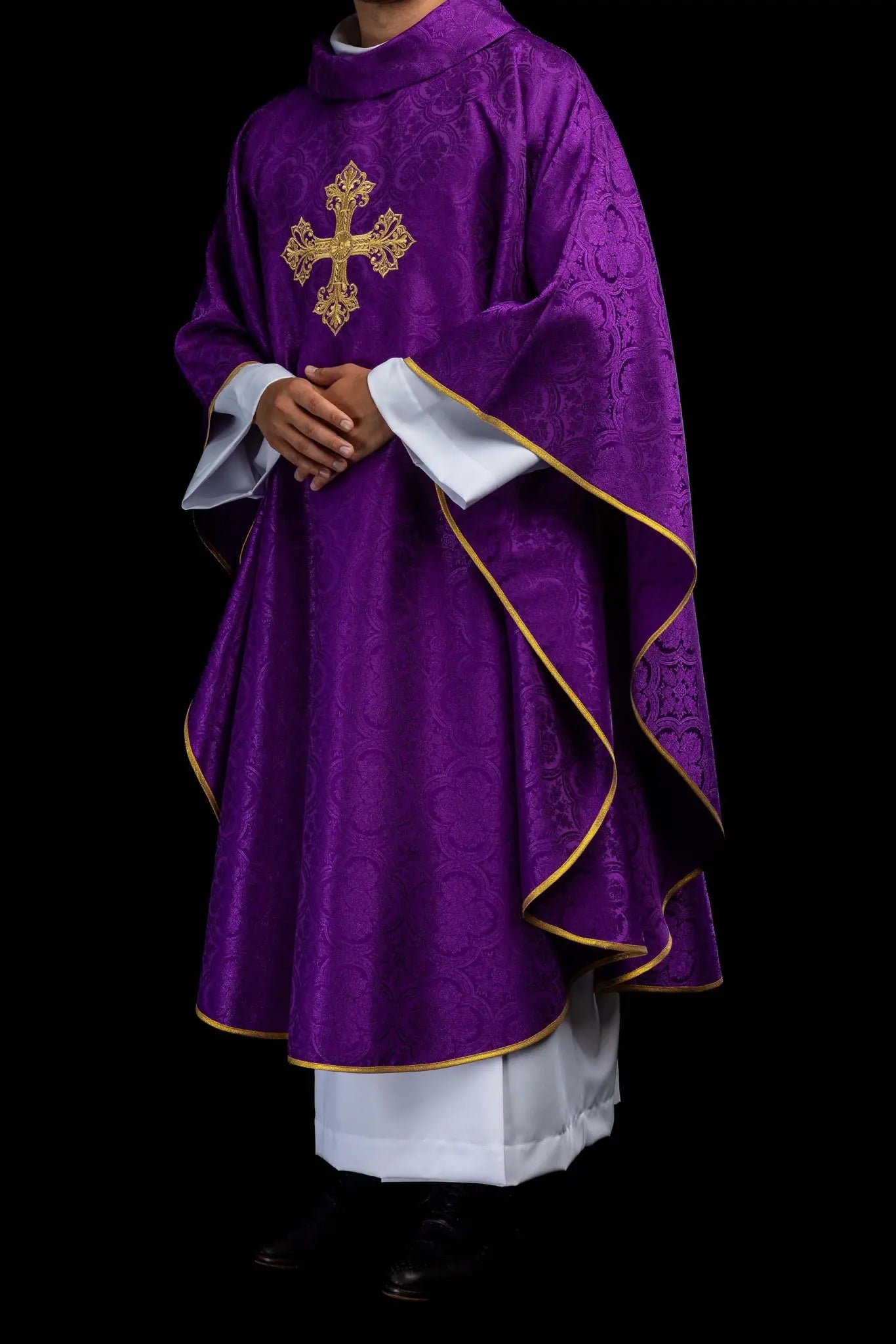 Purple chasuble with a gold embroidered cross on jacquard fabric, featuring a stand-up collar and gold trim.