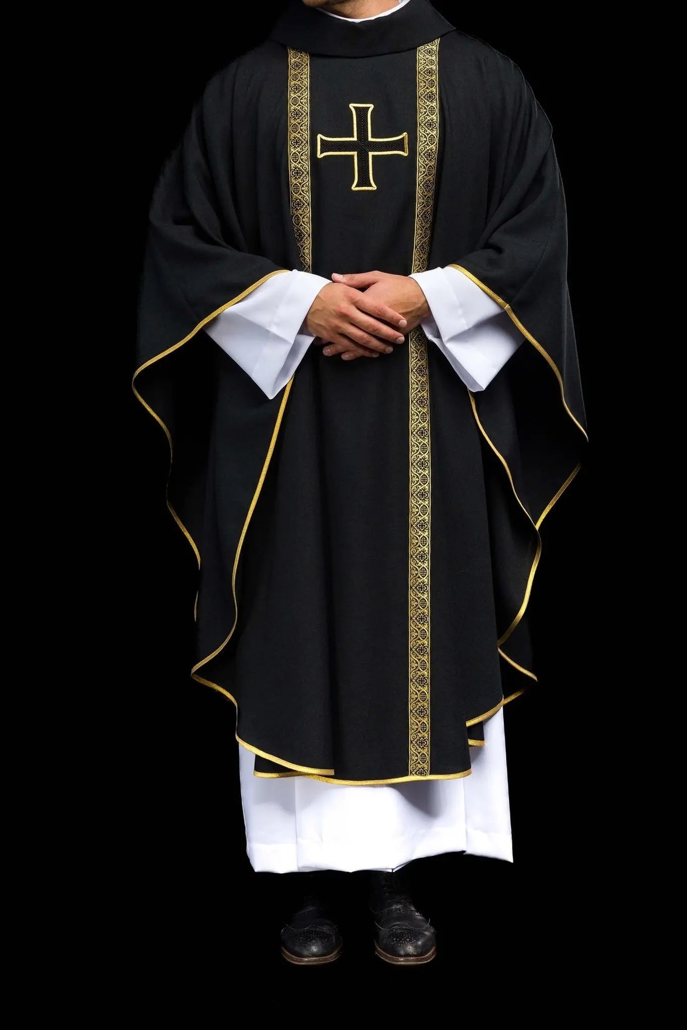 Black liturgical chasuble with embroidered cross and jacquard bands