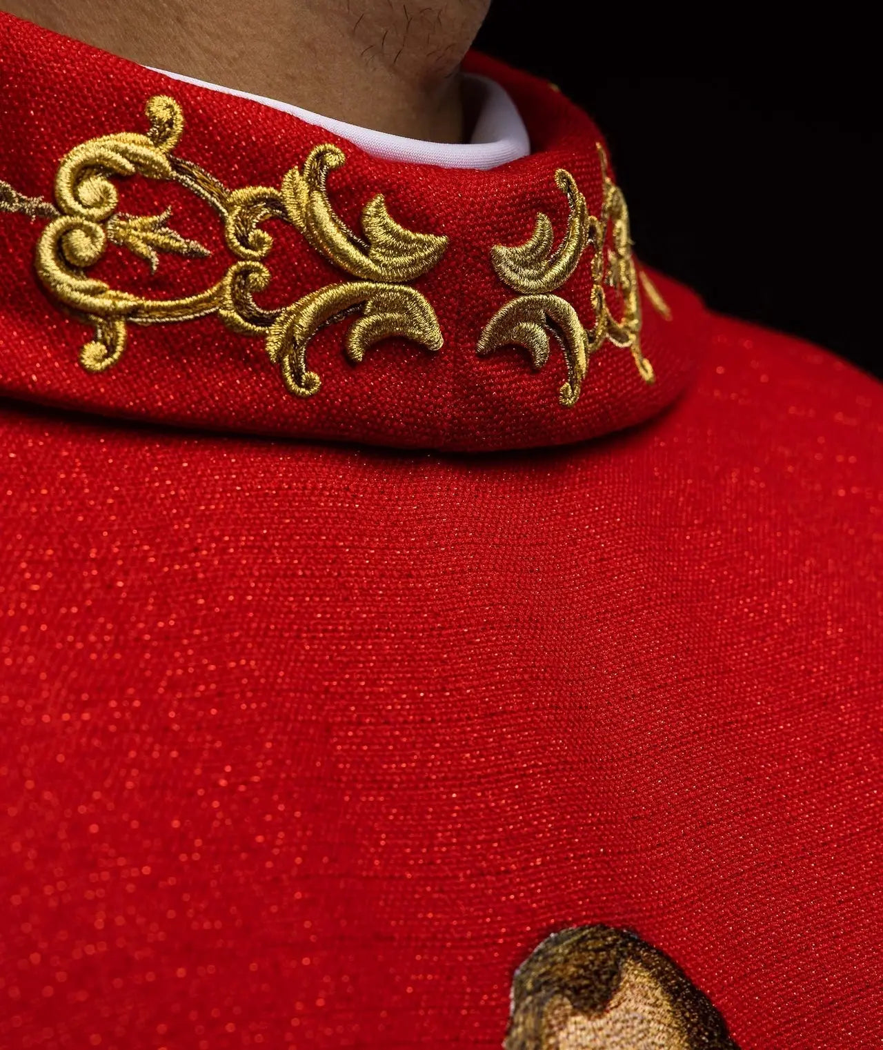 Richly embroidered chasuble with the image of Saint Paul red