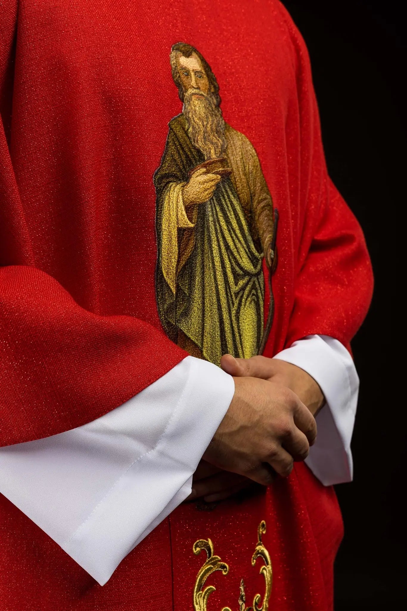 Richly embroidered chasuble with the image of Saint Paul red