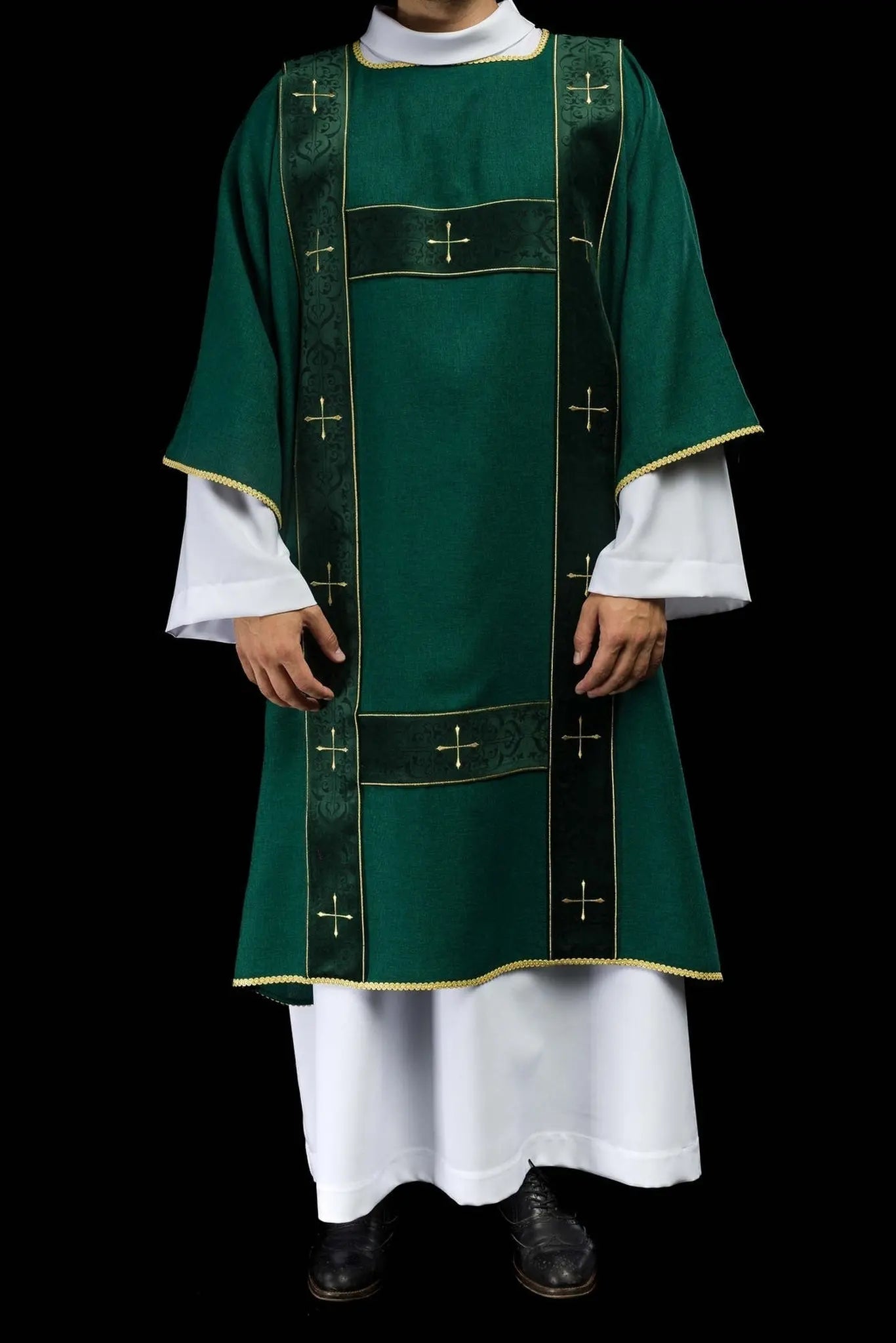 Green dalmatic with velvet stripes and embroidered gold crosses