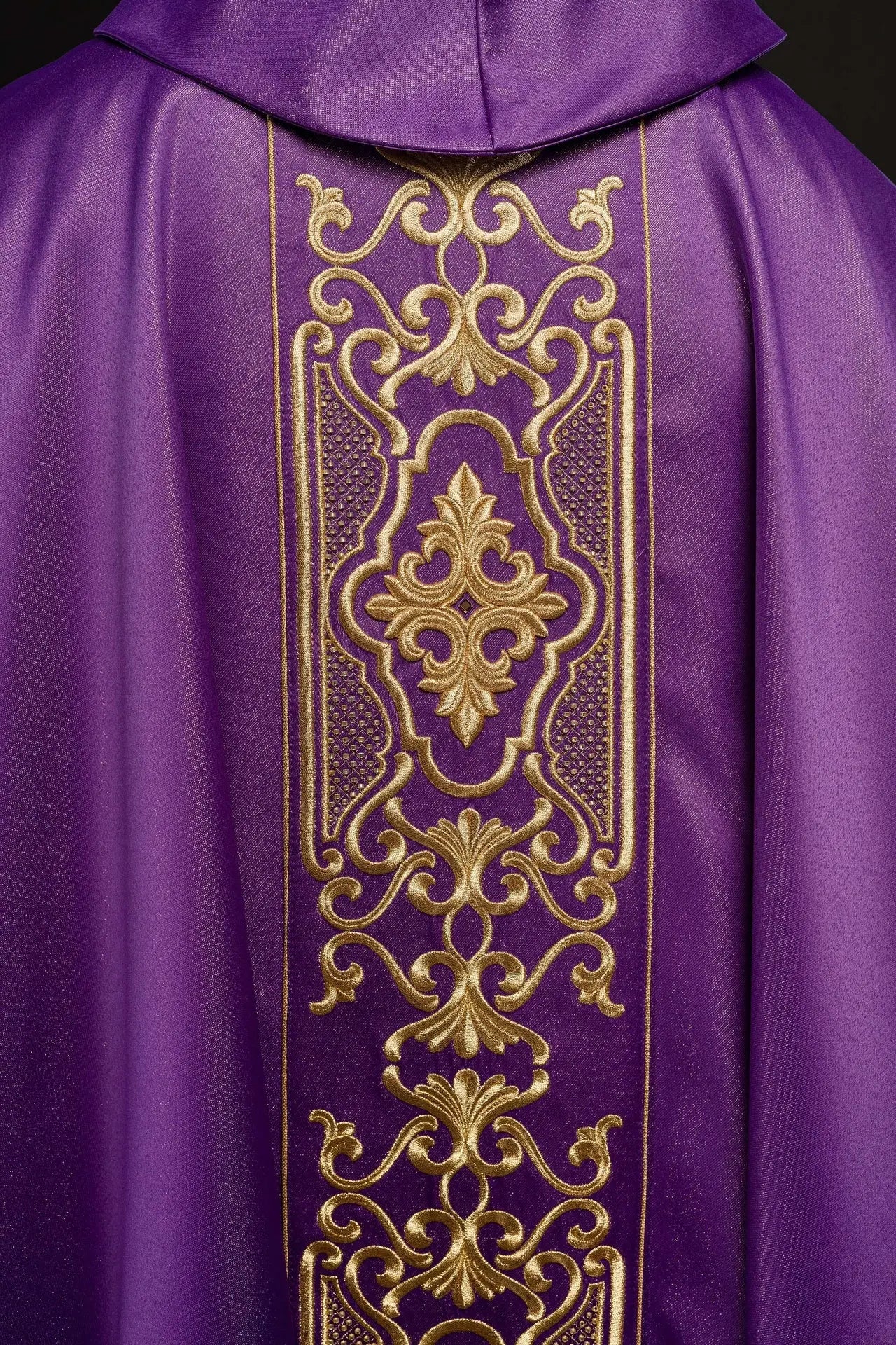Purple chasuble richly embroidered lustre