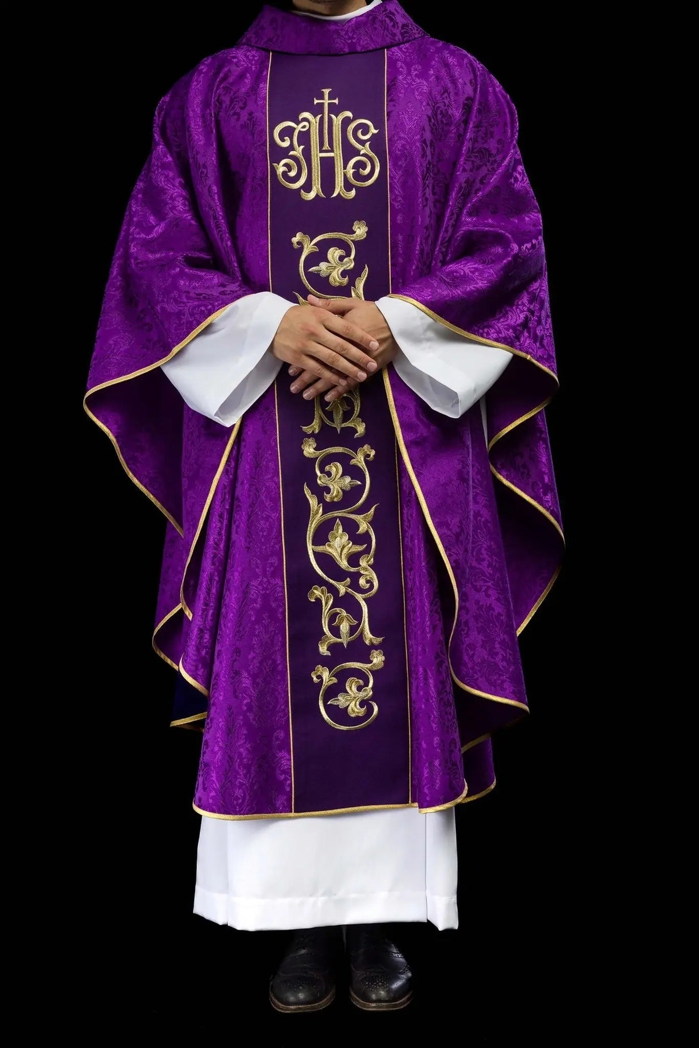 Purple liturgical chasuble with richly decorated IHS belt