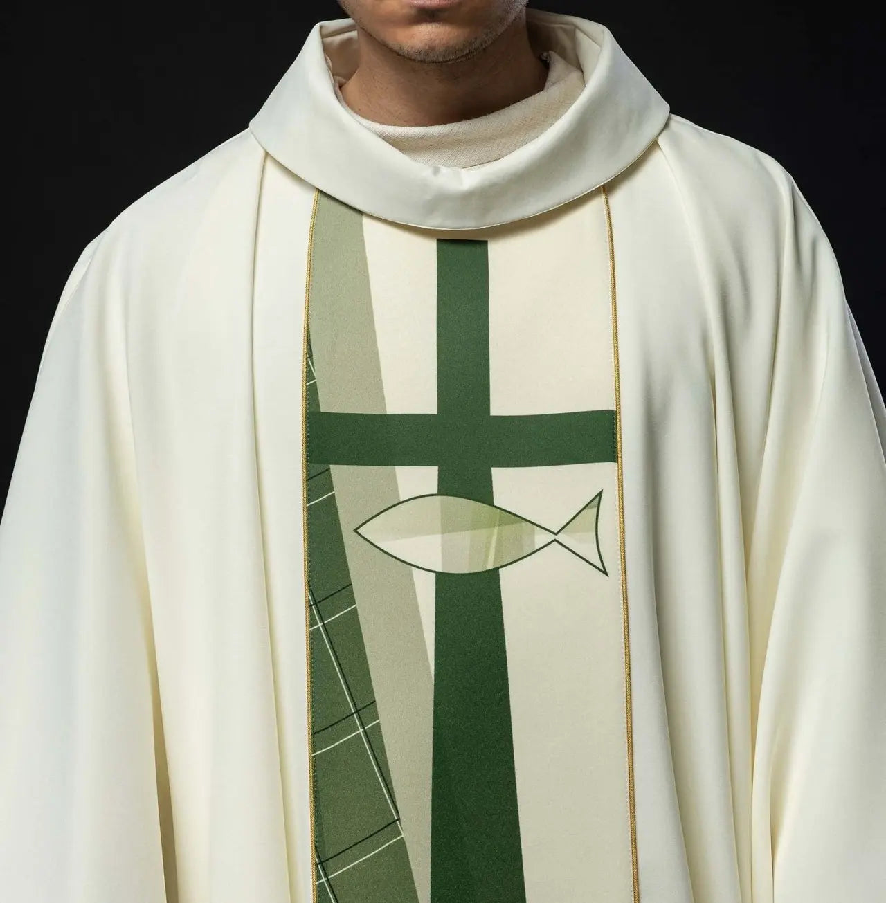 White chasuble embroidered with cross and fish pattern
