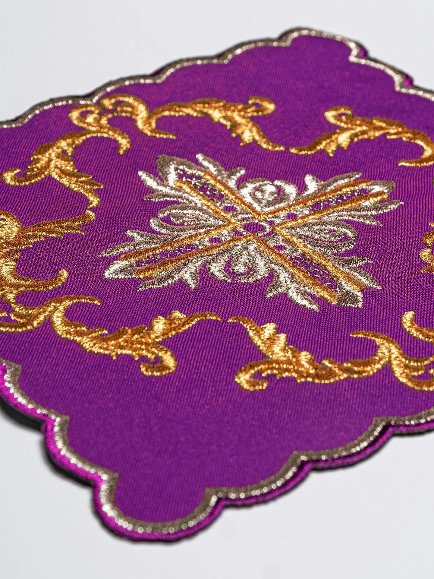 Purple embroidered chalice linen with cross motif