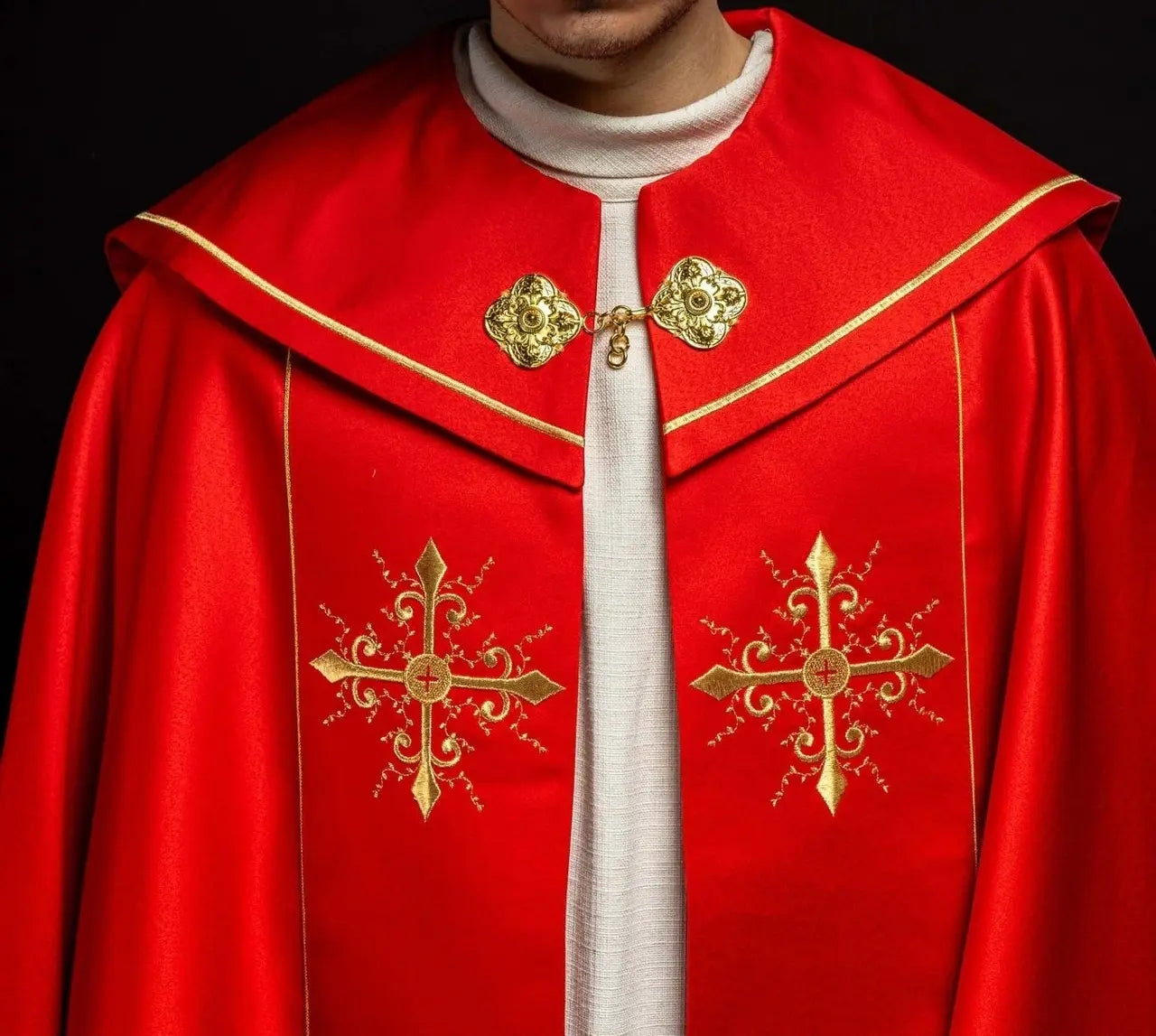 Red liturgical cope with gold crosses embroidery