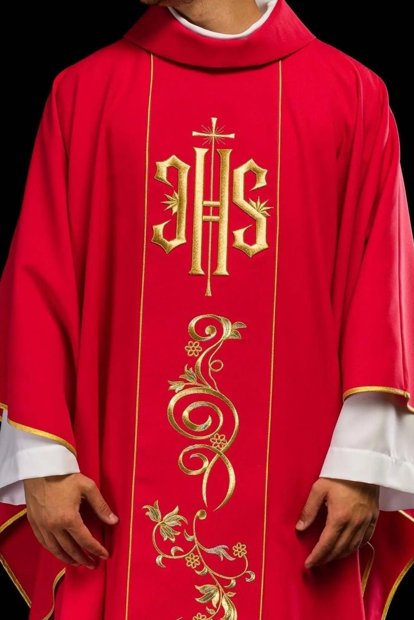 Red chasuble embroidered with IHS