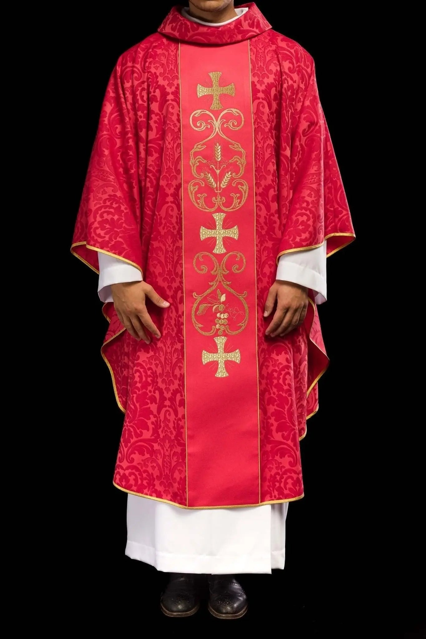 Red liturgical chasuble decorated with embroidered belt