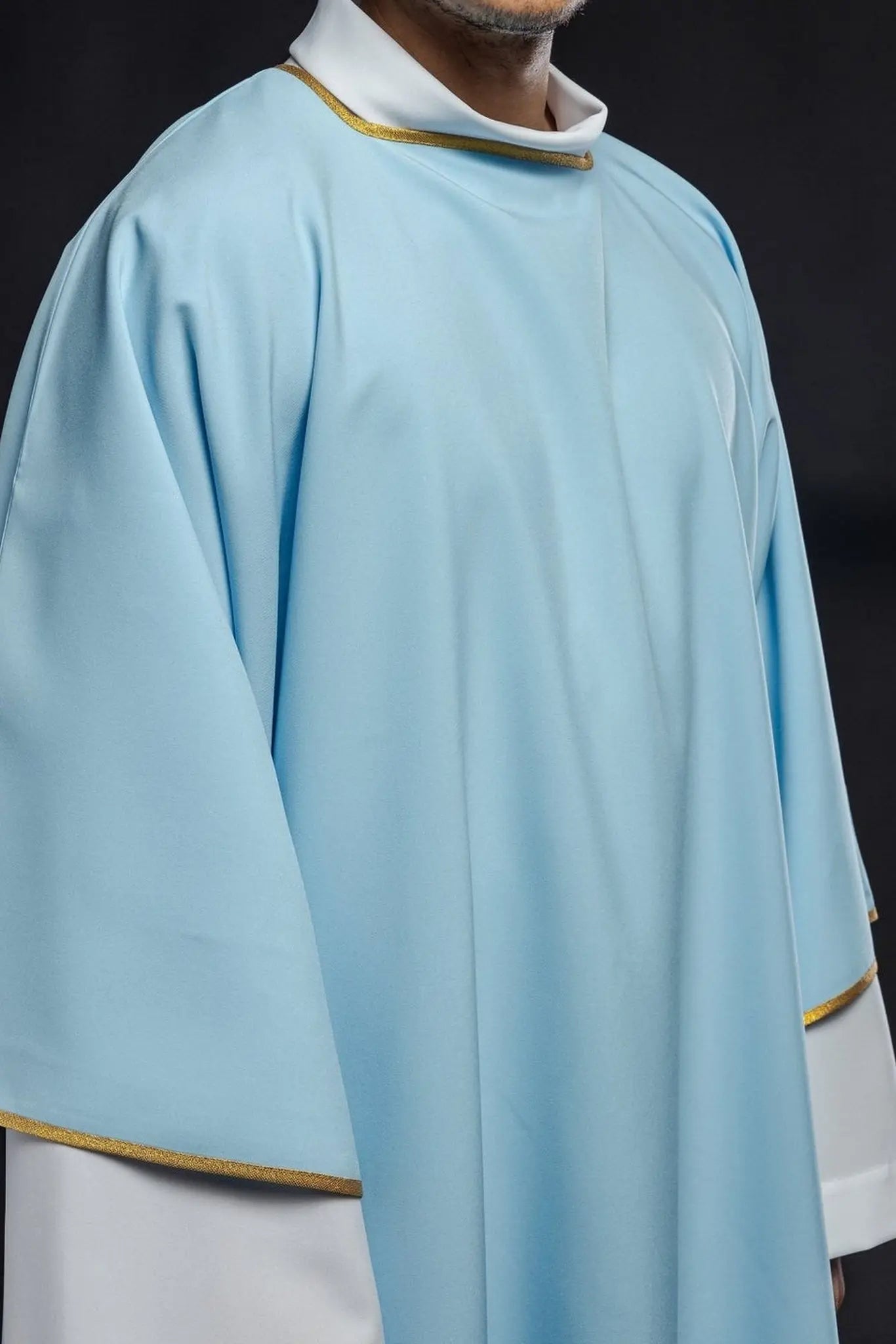 Embroidered plain dalmatics with gold trim blue
