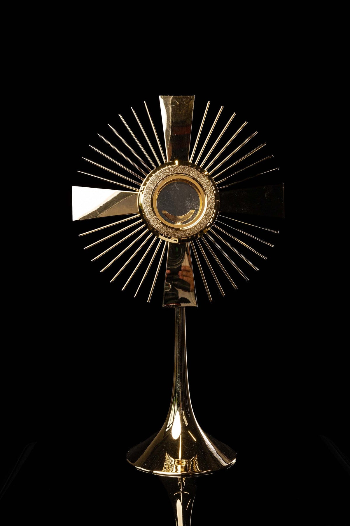 Gold-plated brass monstrance with cross and rays, front view