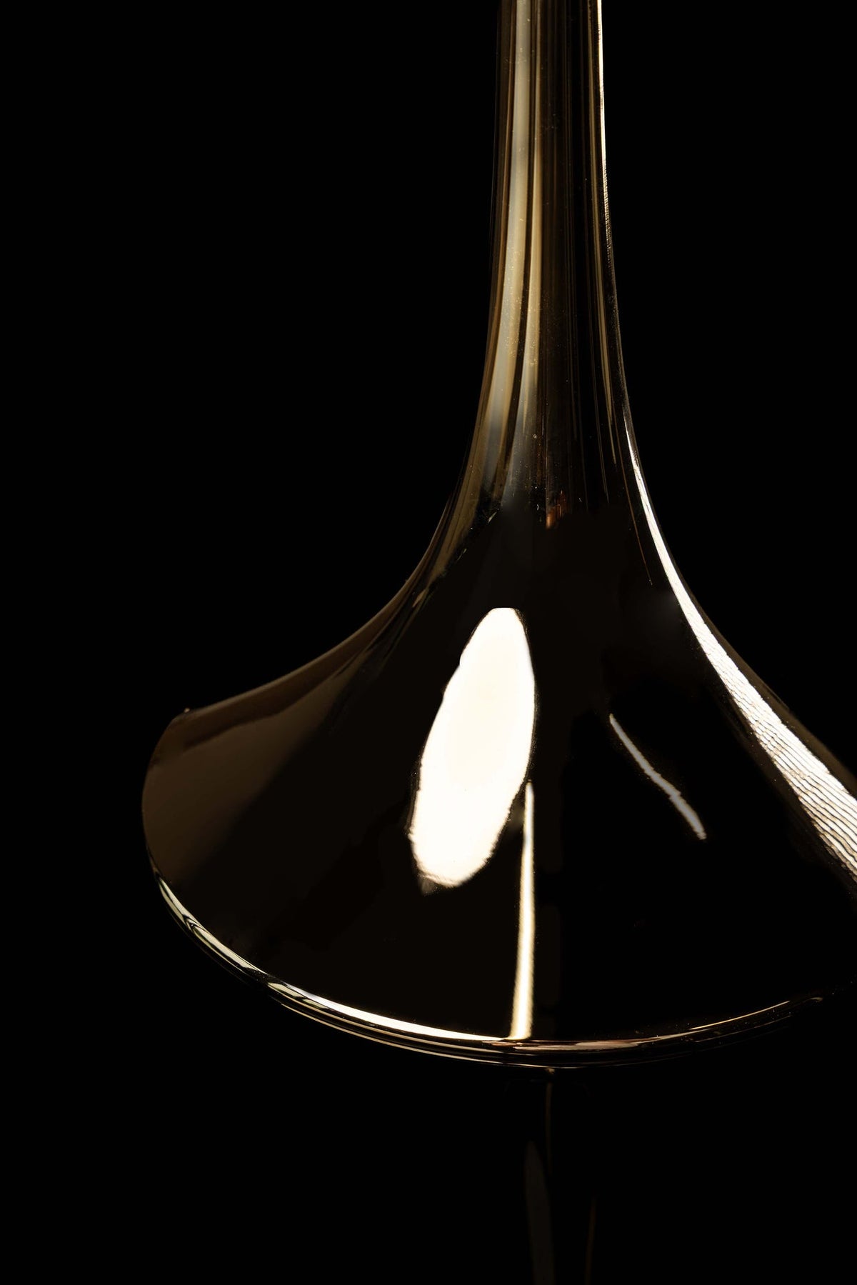 Gold-plated brass monstrance with cross and rays, base close-up