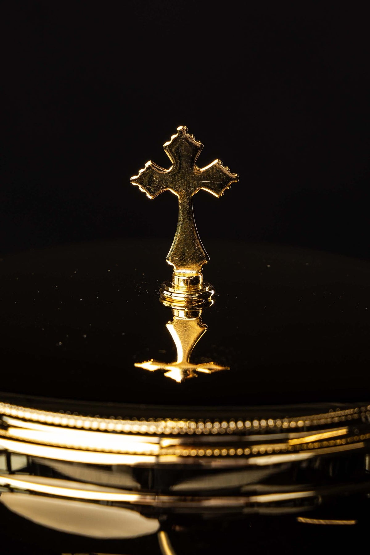 Gold-plated brass ciborium with cross finial, lid close-up