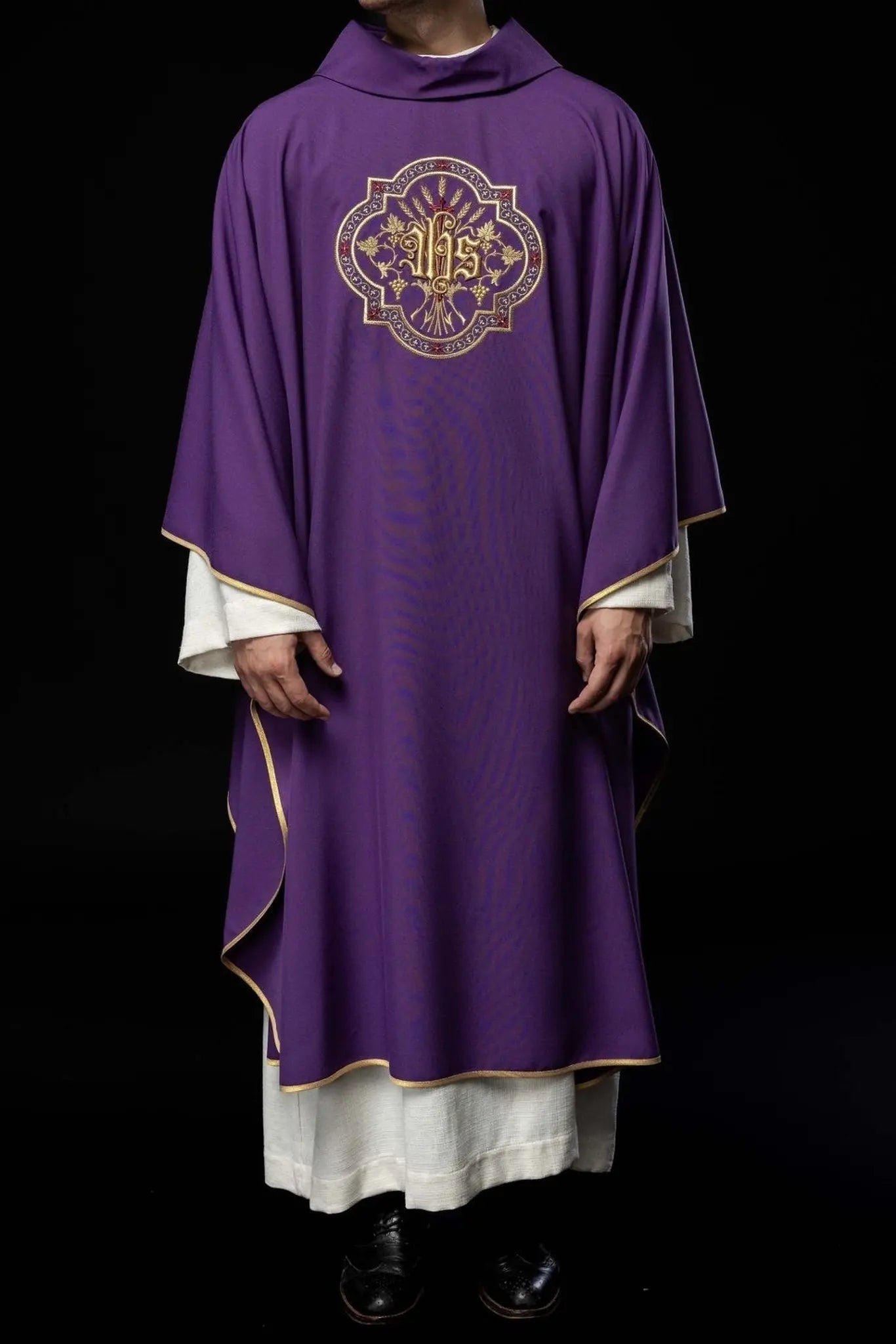 Purple chasuble with IHS and PAX embroidery