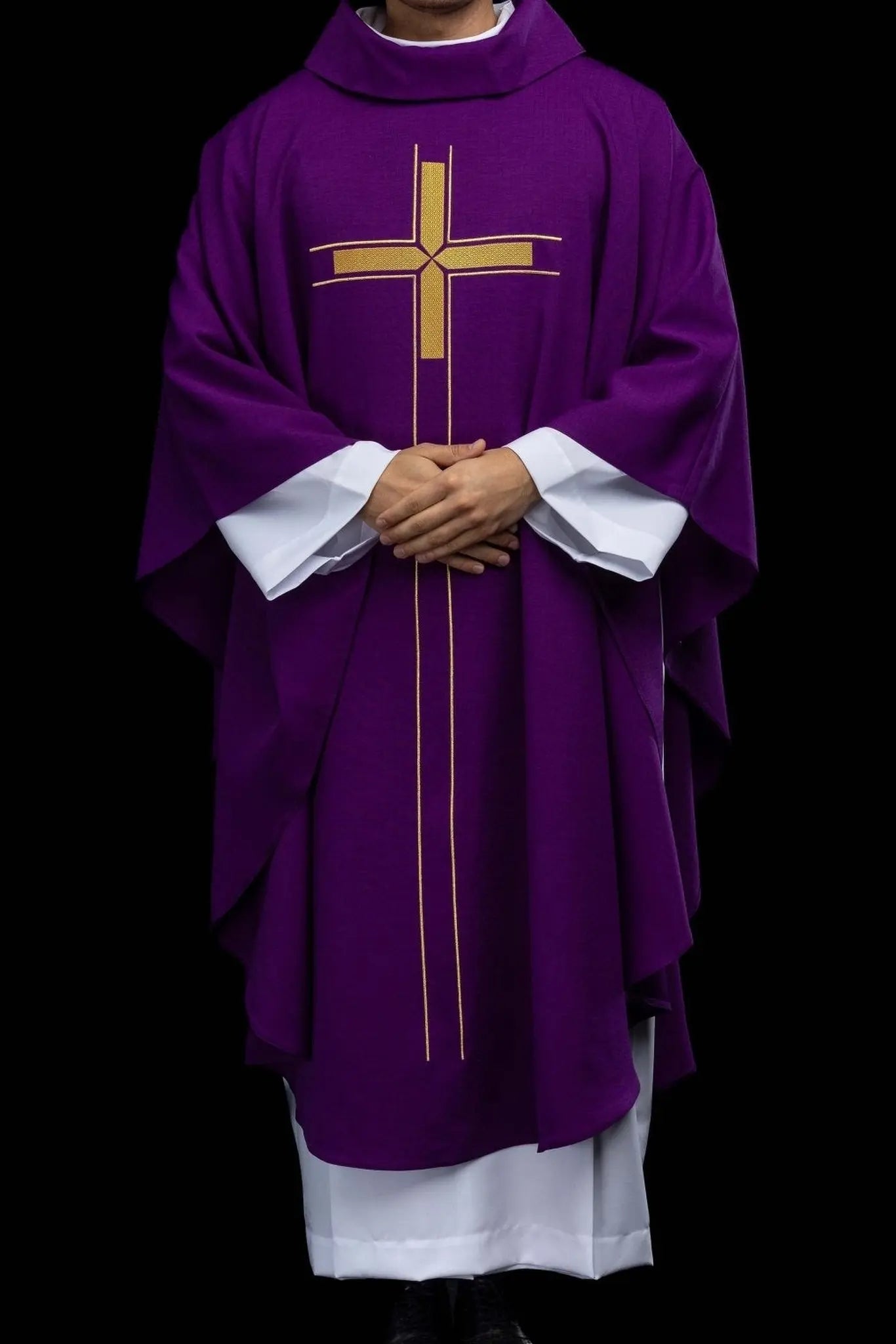 Purple chasuble with an embroidered cross motif