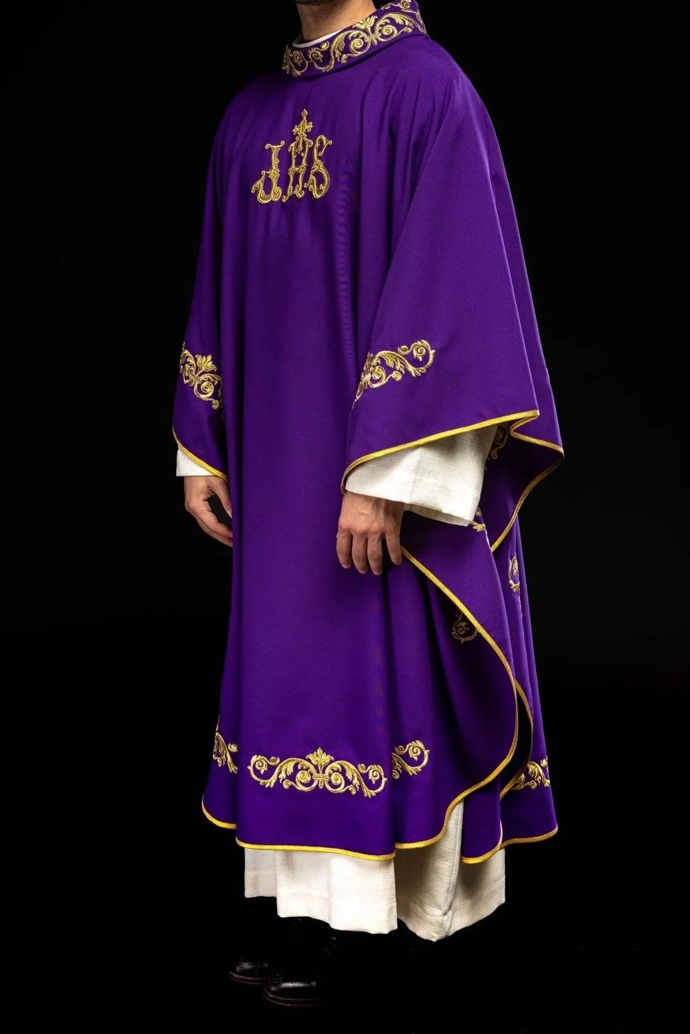 Purple chasuble with gold IHS embroidery and decorative trim