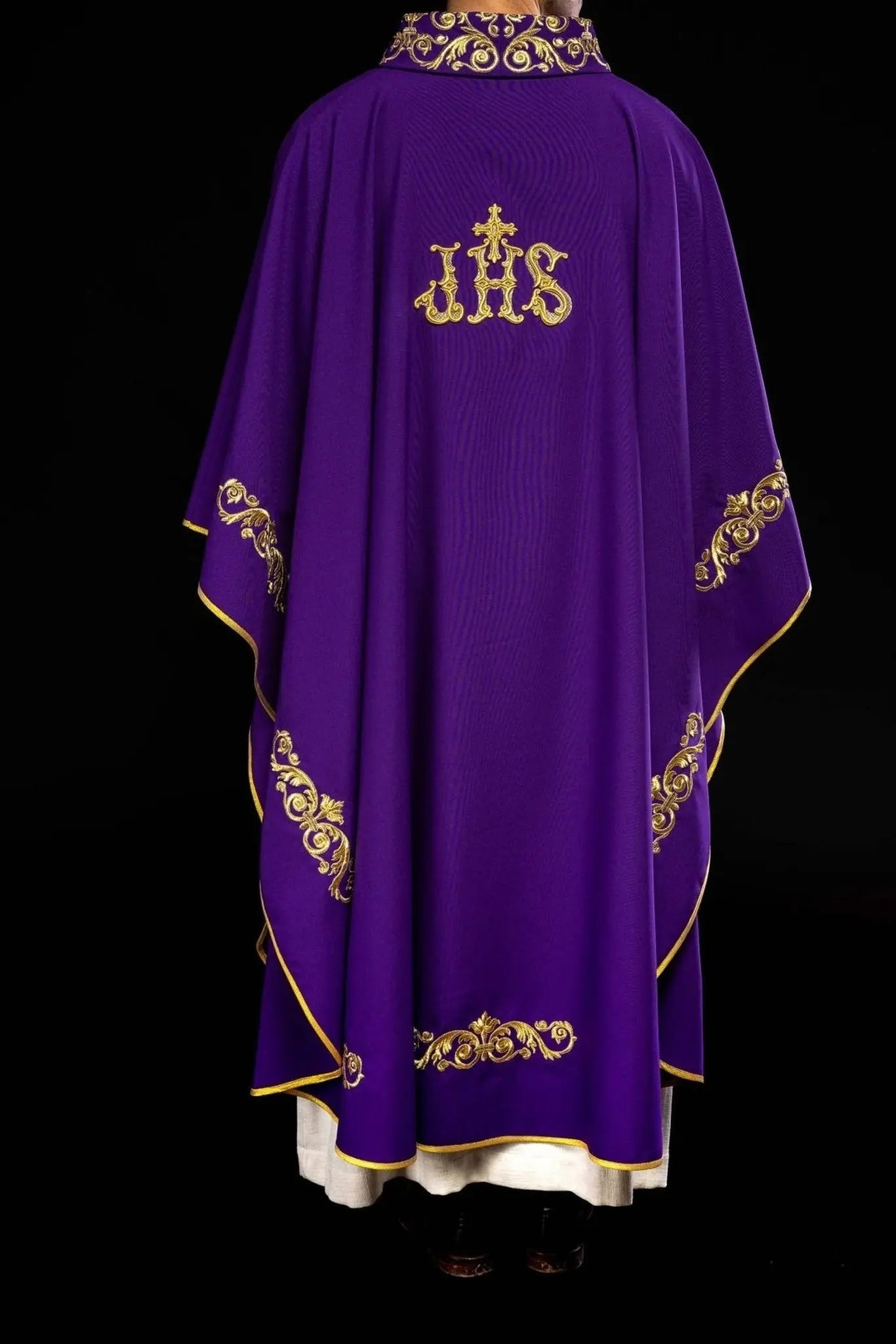 Purple chasuble with gold IHS embroidery and decorative trim