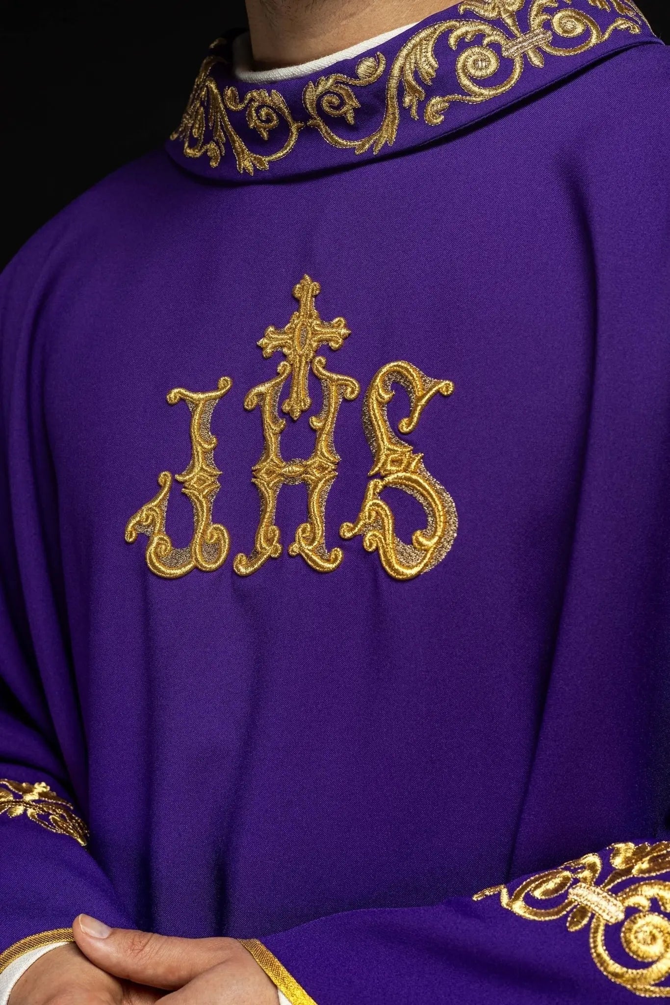 Purple chasuble with gold IHS embroidery and decorative trim