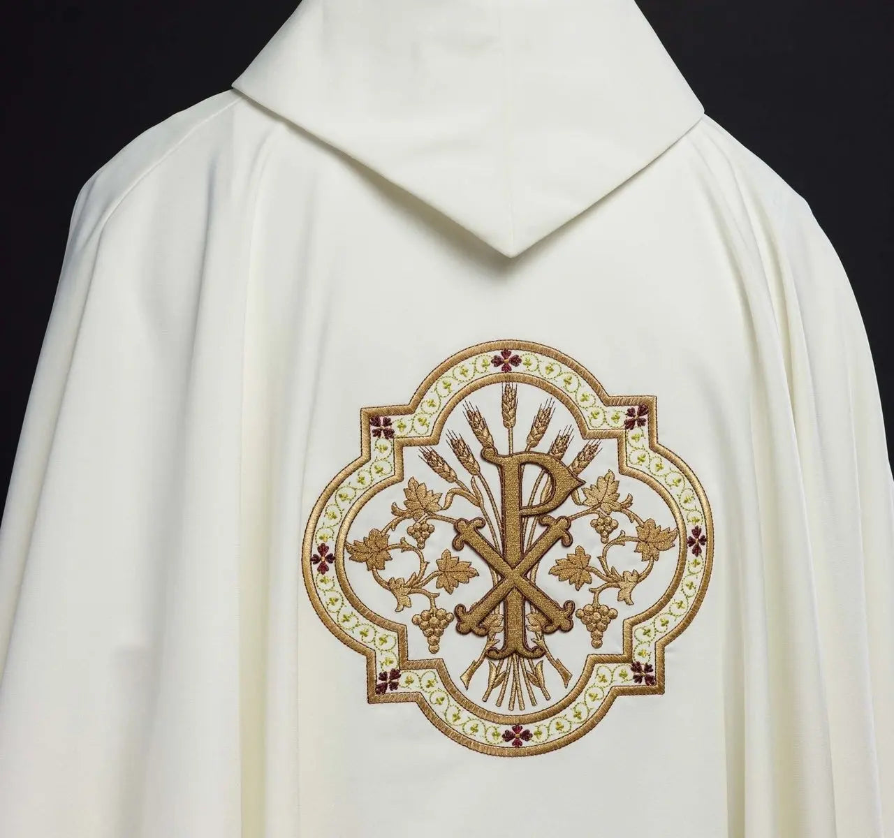 Cream chasuble with IHS and PAX embroidery