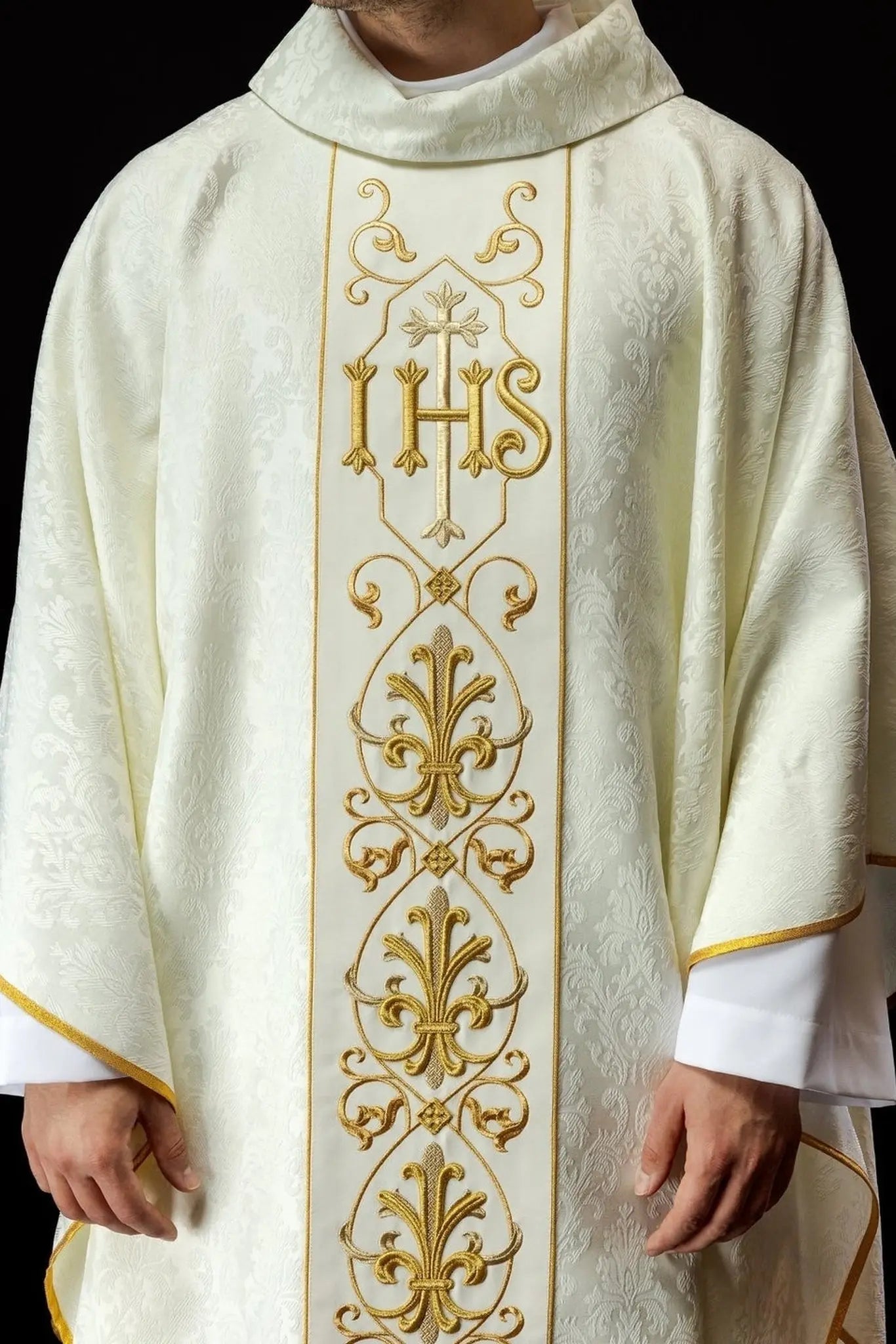 Ecru chasuble embroidered on decorative fabric with IHS symbol