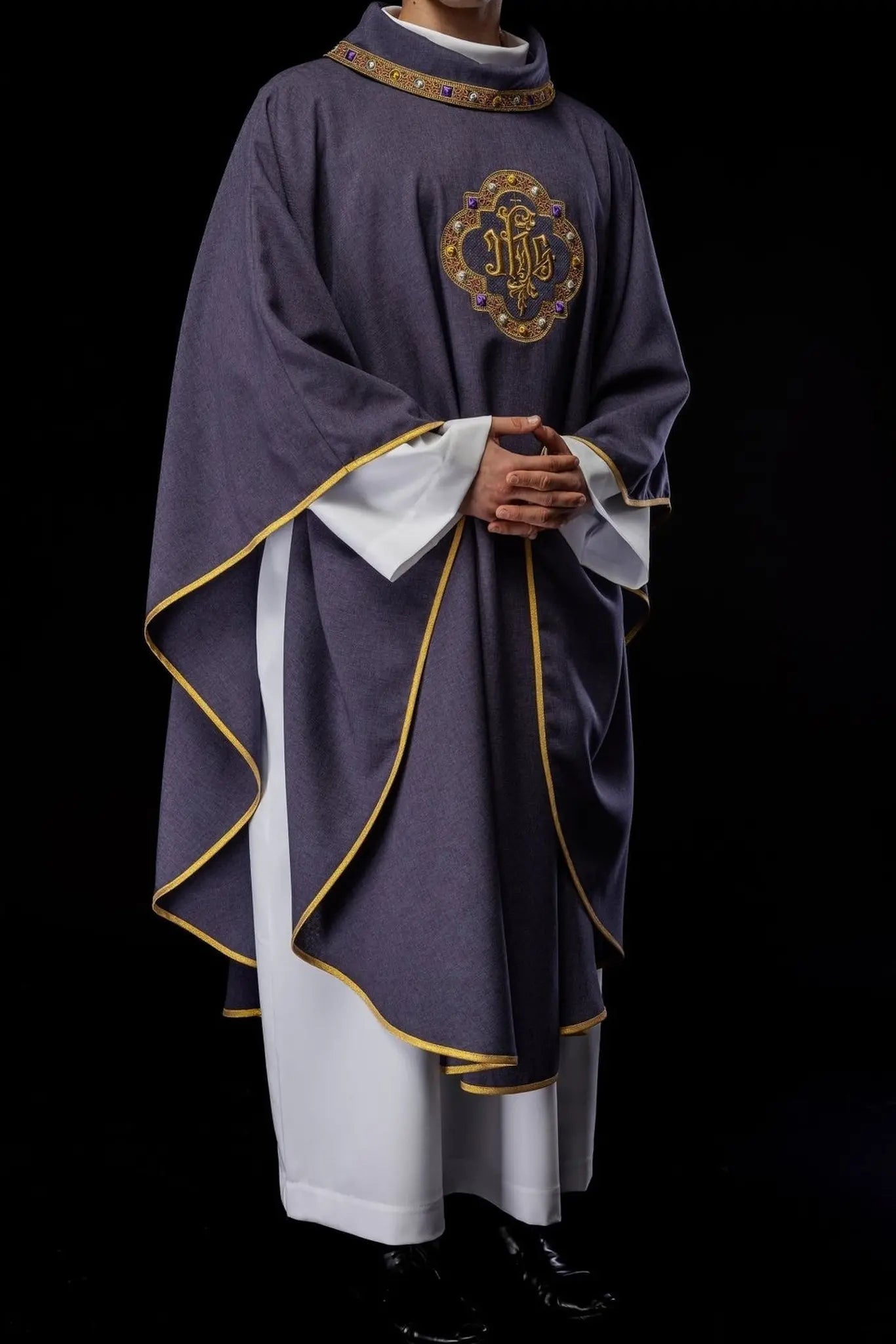 Chasuble with richly embroidered belt and piping around IHS I collar embroidery in purple color