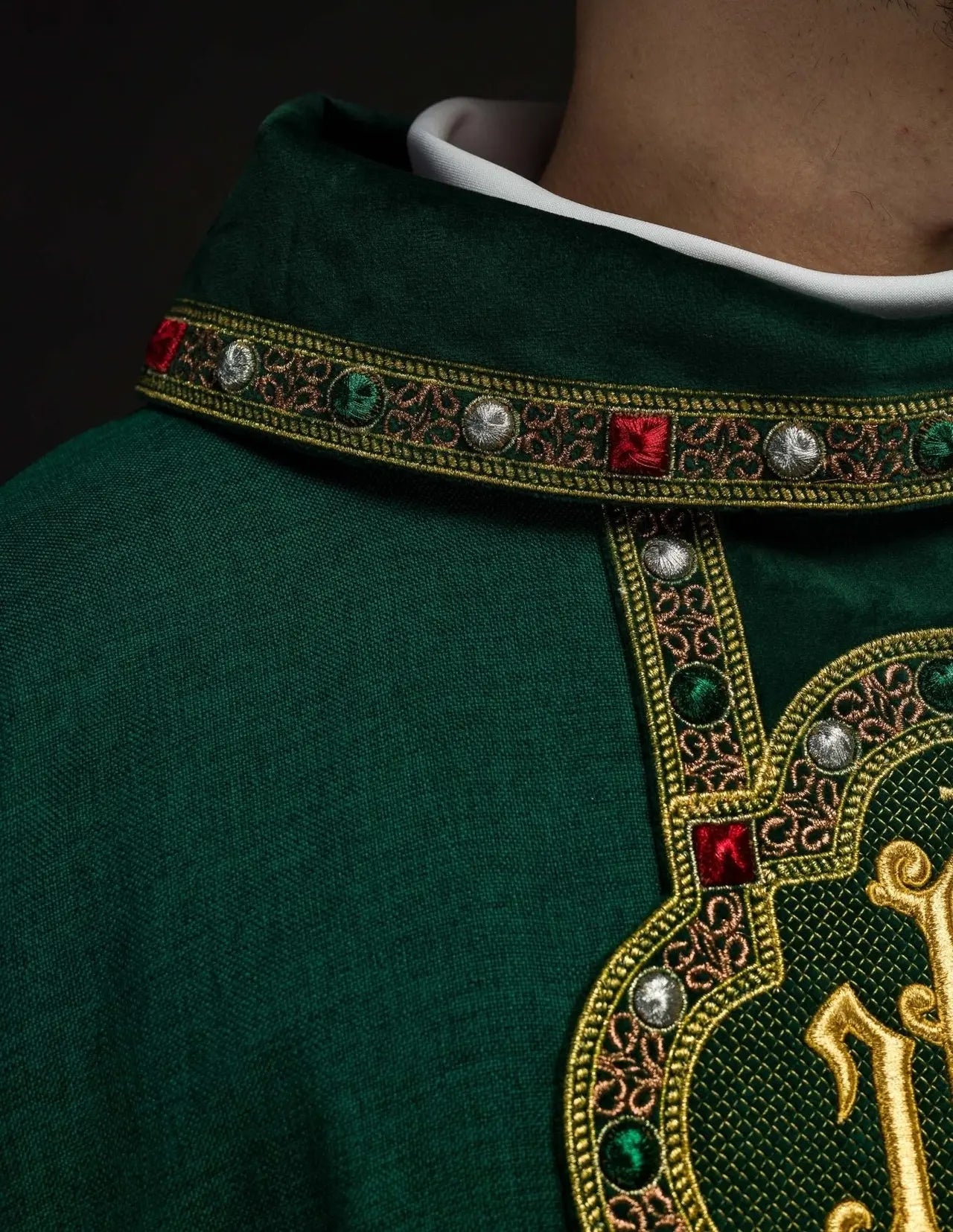 Chasuble with richly embroidered belt and piping around IHS embroidery and collar in green