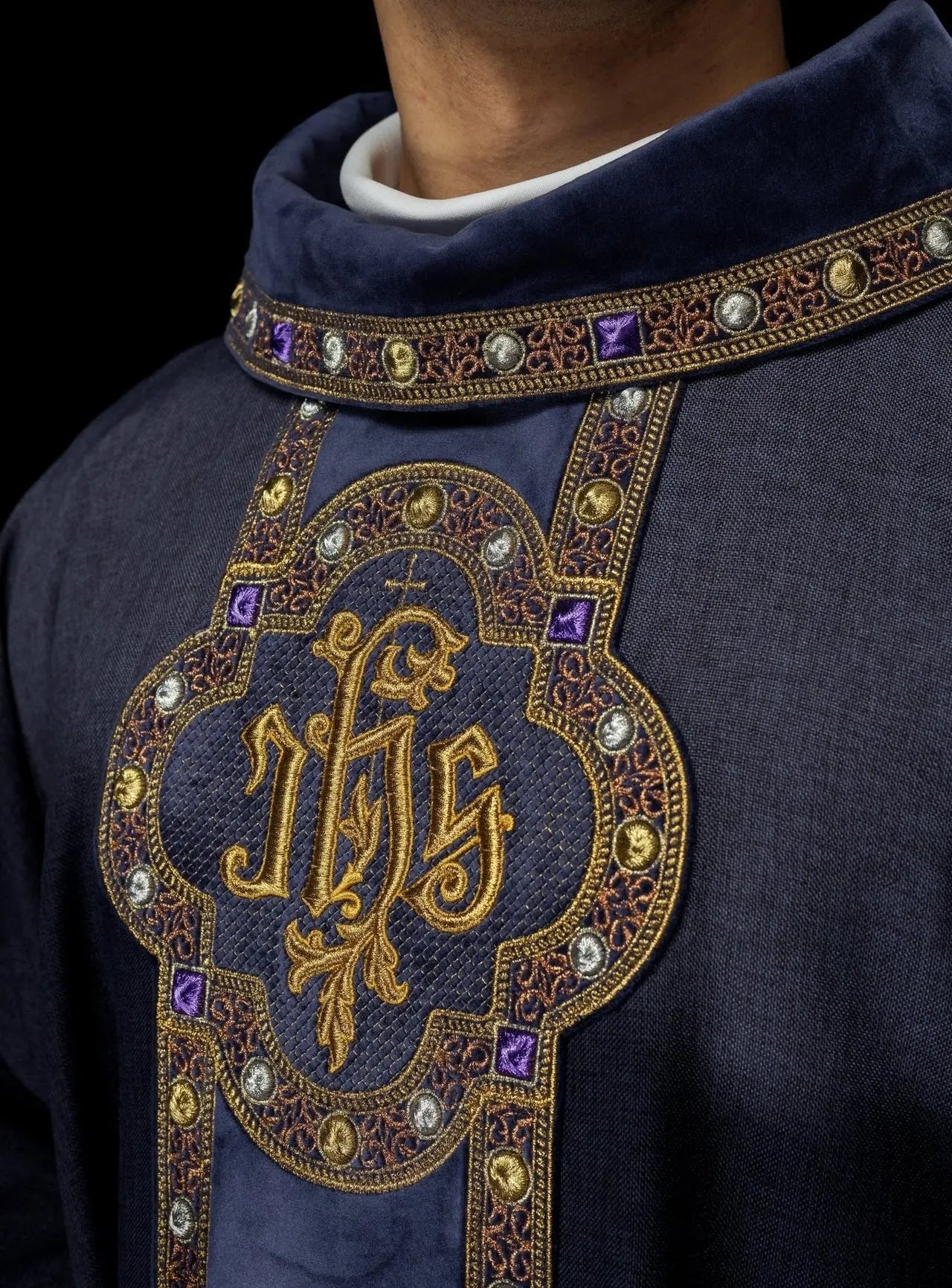 Chasuble with richly embroidered belt and piping around the IHS embroidery and collar in purple