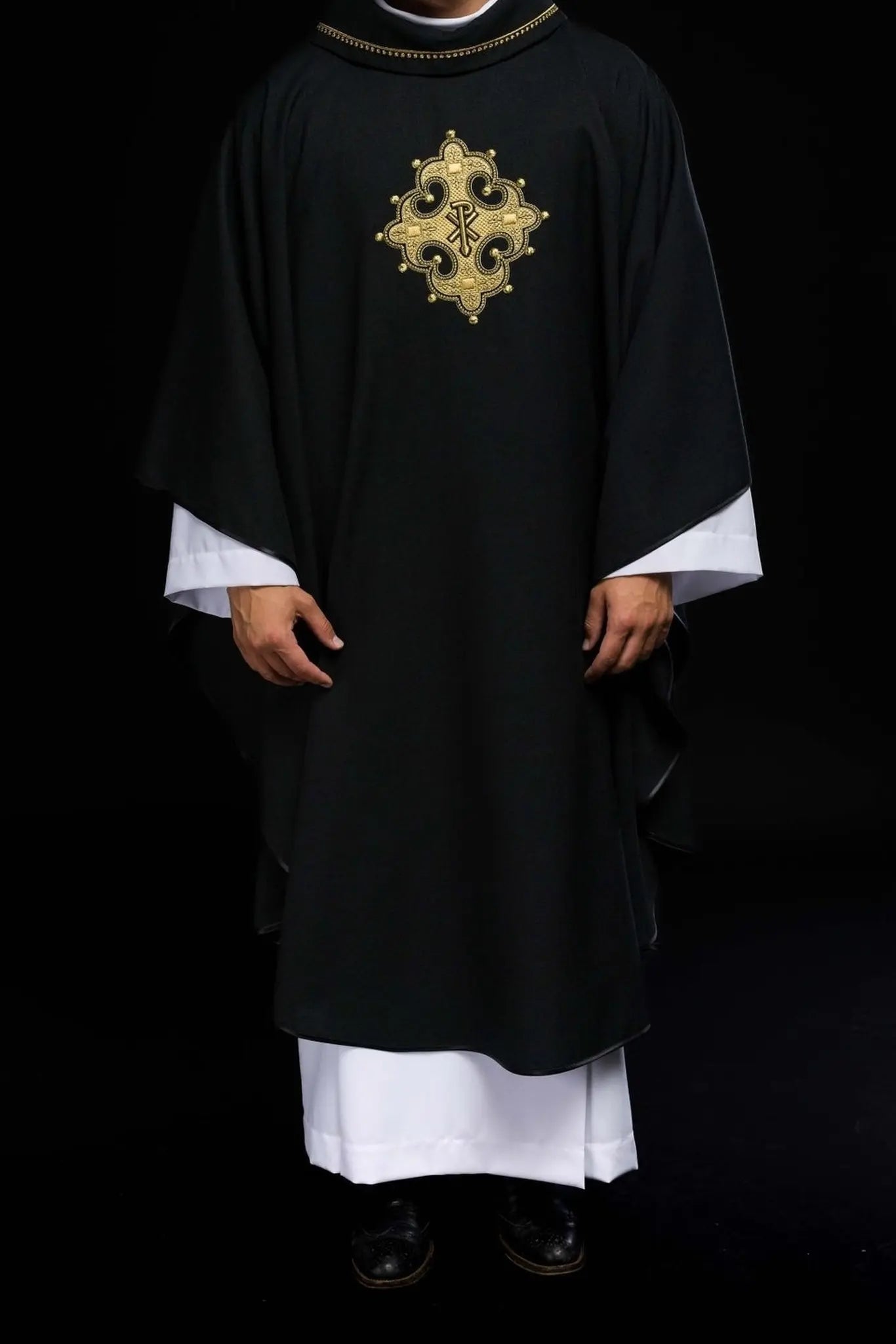Chasuble with embroidered cross and gold trim on collar in black