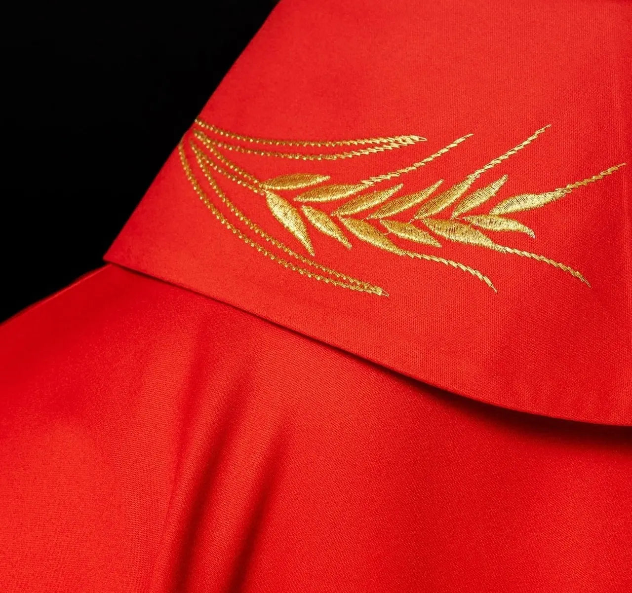 Chasuble with embroidered cross and red ear motifs